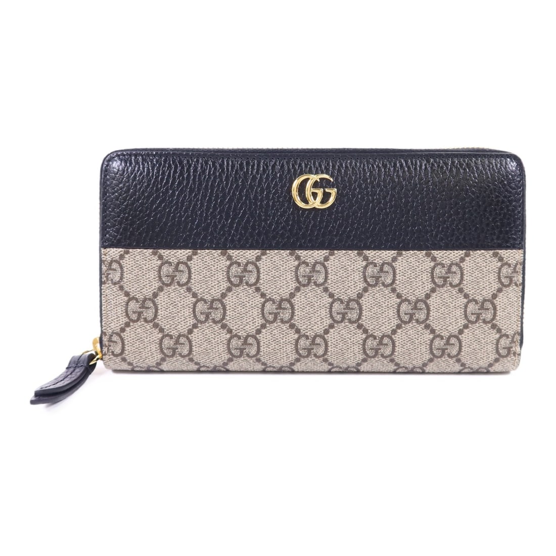 Black and Beige GG Marmont Long Wallet by Gucci in PVC Coated Canvas: Black and Beige GG Marmont Long Wallet by Gucci in PVC Coated Canvas This is a Gucci GG Marmont long wallet crafted from PVC coated canvas in a black and beige color scheme. The wallet features an aro