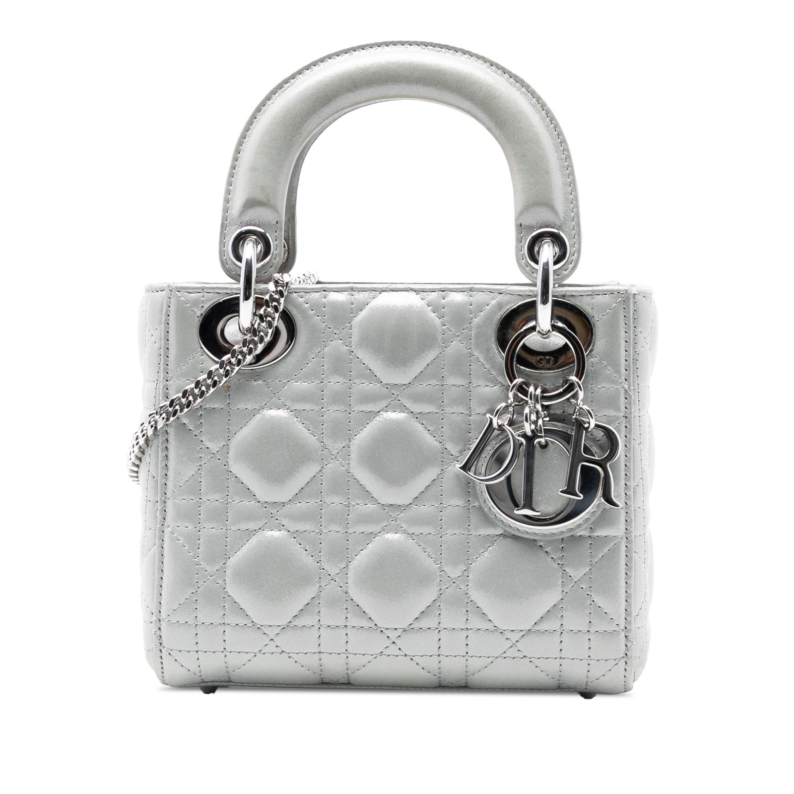 Dior Mini Iridescent Lambskin Cannage Lady Dior Bag: Dior Mini Iridescent Lambskin Cannage Lady Dior Bag This Mini Iridescent Lambskin Cannage Lady Dior bag showcases a stunning iridescent quilted lambskin leather exterior in a striking silver hue. It f