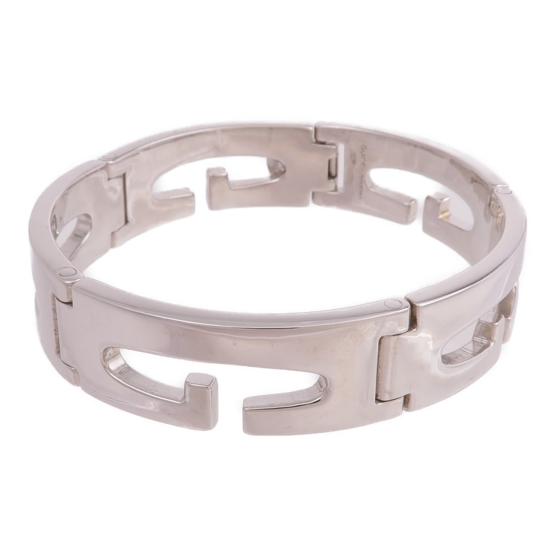 Sterling Silver GG Bracelet by Gucci Italy: Sterling Silver GG Bracelet by Gucci Italy This Gucci bracelet is crafted from 925 sterling silver, offering a sleek and timeless look. Made in Italy, it features a classic design without a main stone