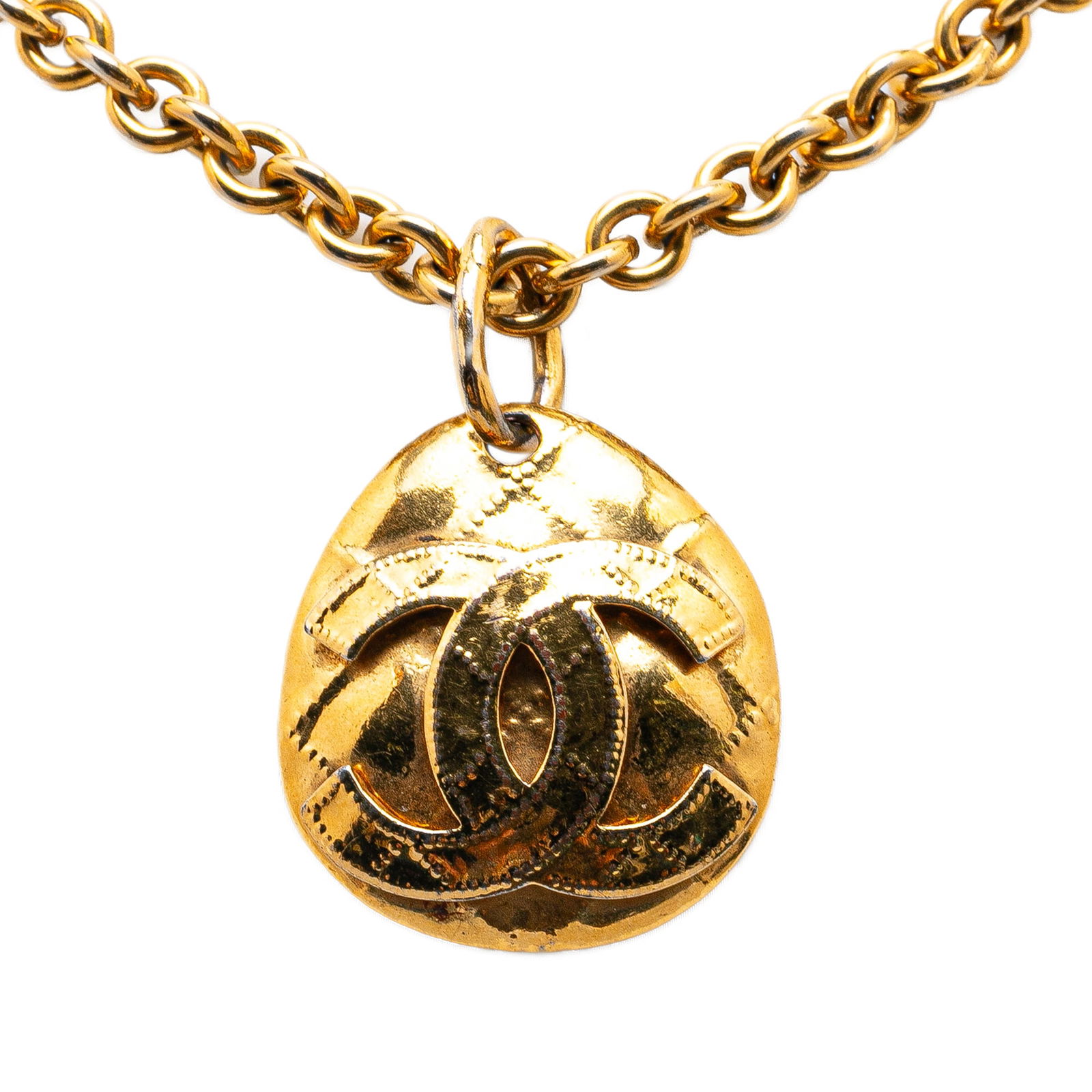 Chanel Gold Plated CC Pendant Necklace Fashion Jewelry: Chanel Gold Plated CC Pendant Necklace Fashion Jewelry Embrace timeless elegance with this Chanel Gold Plated CC Round Pendant Necklace. This exquisite piece features a signature CC pendant and a gold