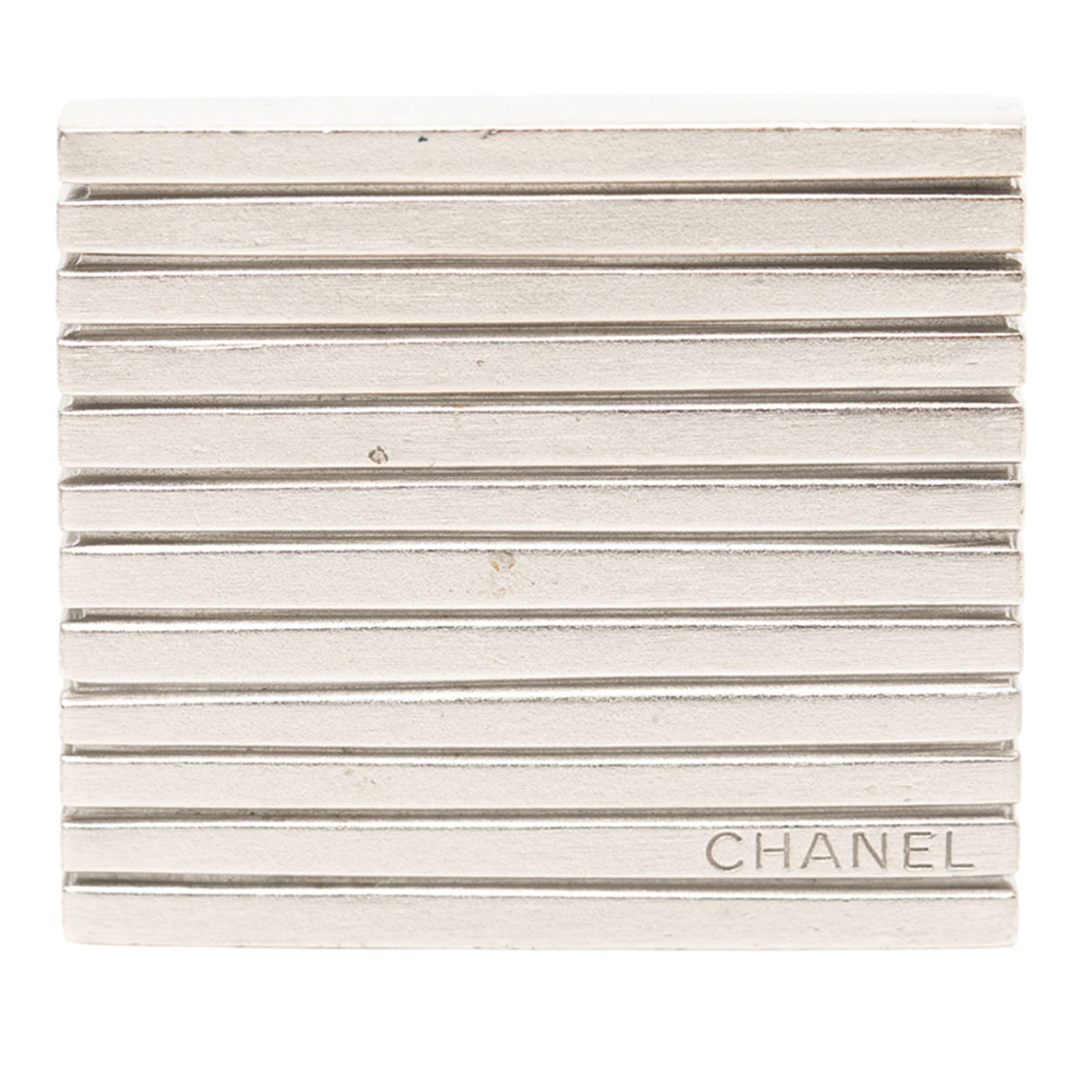 Chanel Silver Logo Square Costume Brooch France: Chanel Silver Logo Square Costume Brooch France This exquisite Chanel Silver Logo Square Brooch showcases a sleek silver-tone metal design, perfect for adding a touch of elegance to any outfit. It fea