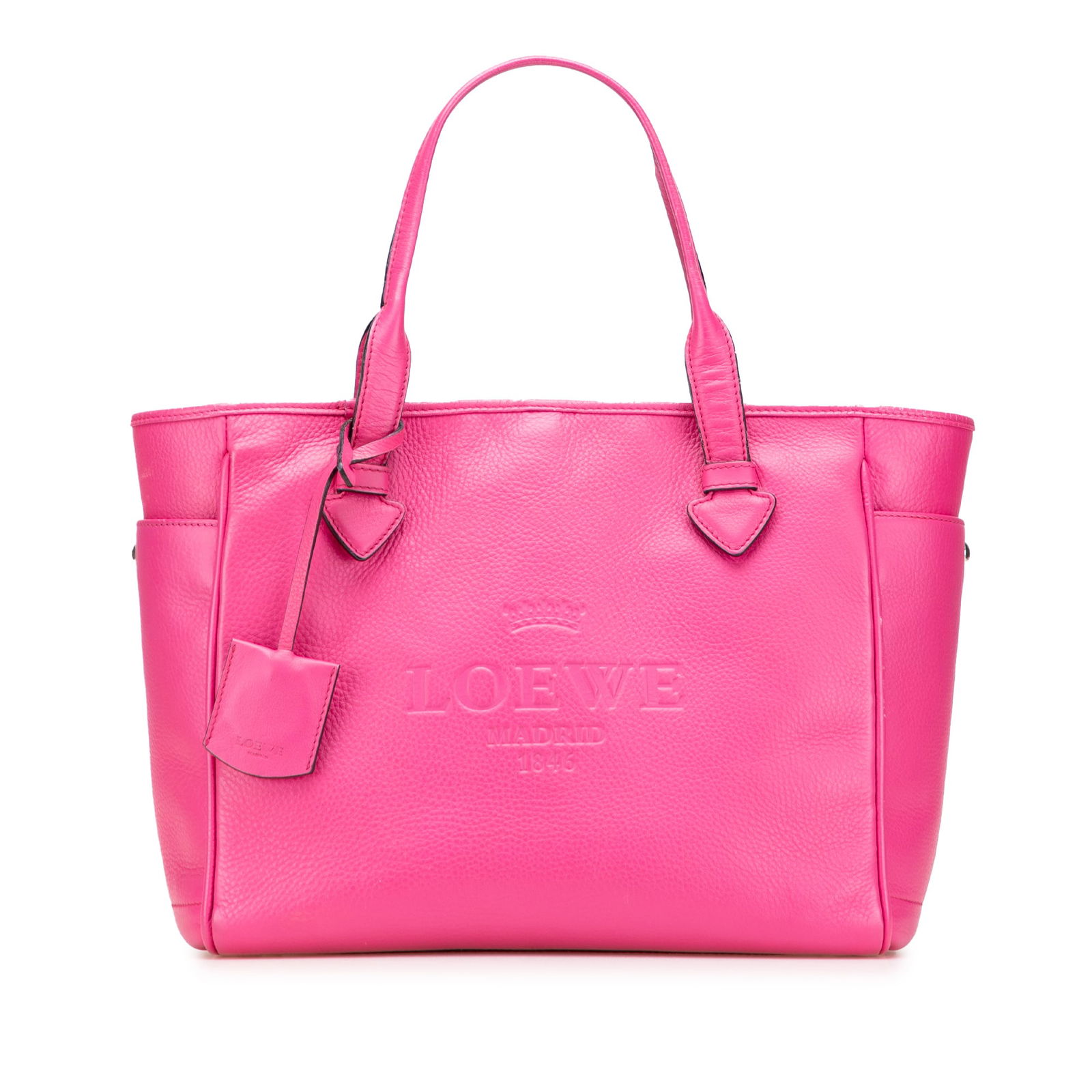 LOEWE Leather Heritage Tote Bag Pink Spain: LOEWE Leather Heritage Tote Bag Pink Spain This LOEWE Leather Heritage Tote is a stylish and functional bag crafted from high-quality leather. It features a spacious open top secured with a hook lock