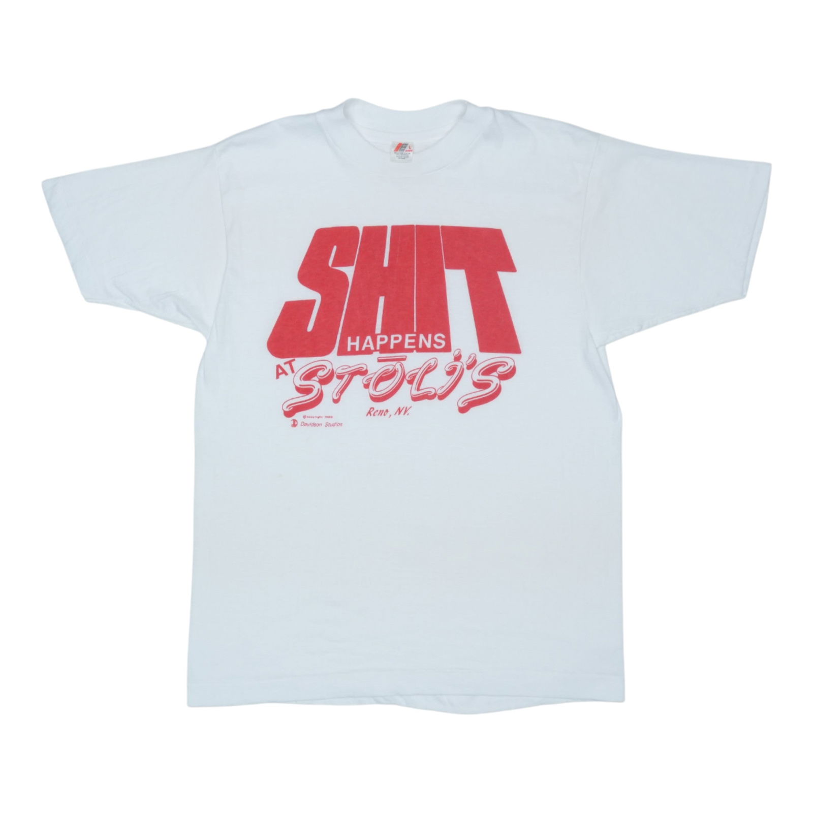 Vintage 1988 White Stohl's Reno Graphic T-Shirt 50/50 Poly Cotton: Vintage 1988 White Stohl's Reno Graphic T-Shirt 50/50 Poly Cotton This is an original vintage 1988 "Shit Happens at Stohl's Reno" shirt. Made from a 50/50 poly/cotton blend, it features front graphics