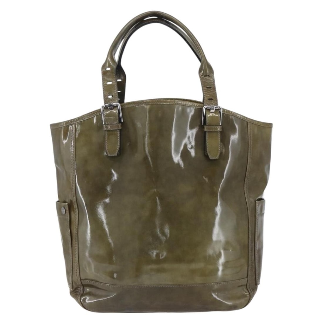 Green Vintage Tote by Salvatore Ferragamo: Green Vintage Tote by Salvatore Ferragamo This Salvatore Ferragamo vintage tote bag in green is a stylish choice for everyday use. It is designed for women and features a spacious interior. The bag is