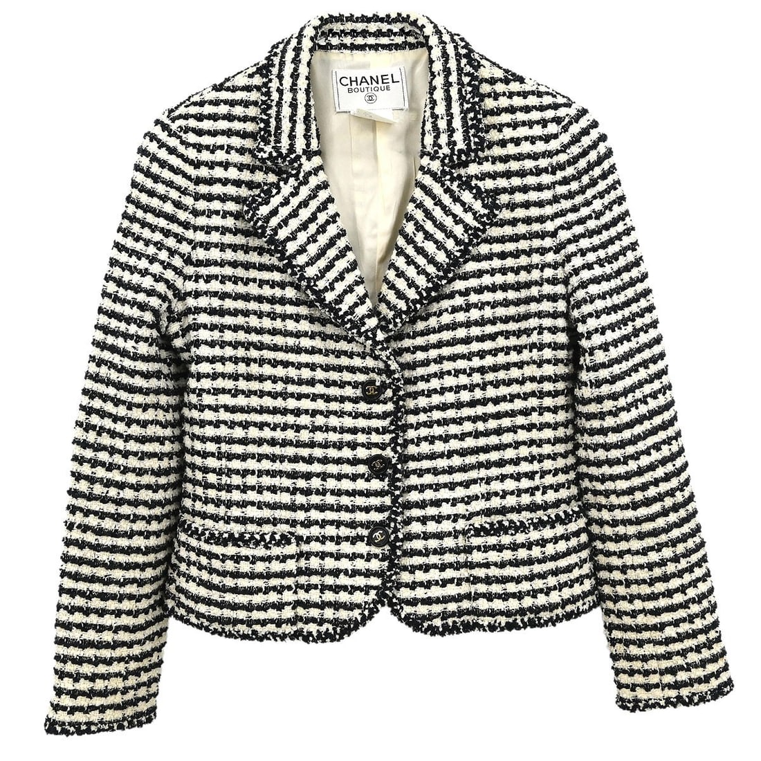 Chanel Black Single Breasted Jacket Vintage 97P #42: Chanel Black Single Breasted Jacket Vintage 97P #42 Elevate your wardrobe with this vintage Chanel single-breasted jacket, crafted from a premium blend of materials for a luxurious feel. The jacket fe