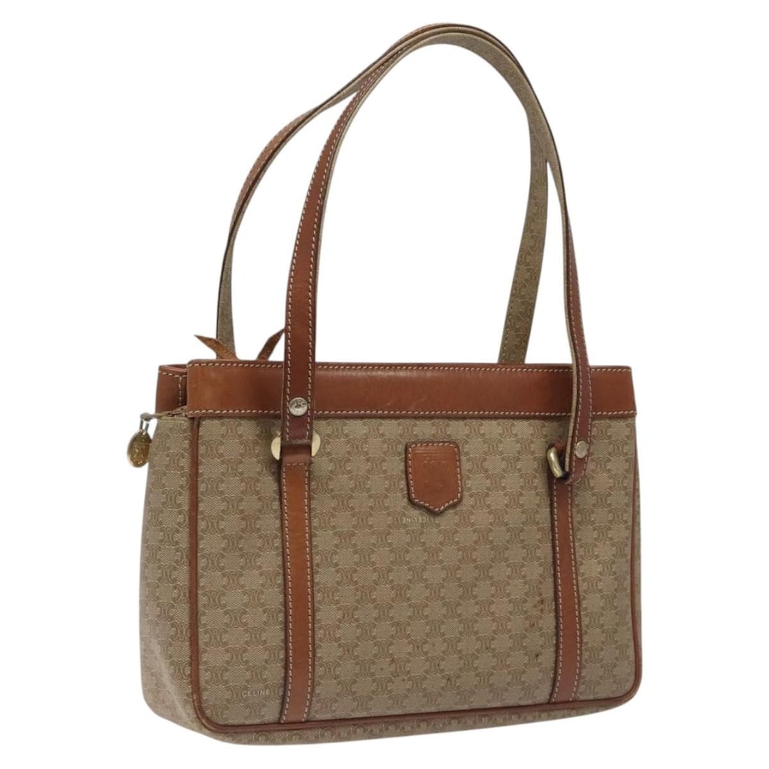 Vintage Macadam Pattern Shopper Tote Bag by Celine Beige: Vintage Macadam Pattern Shopper Tote Bag by Celine Beige This Celine Vintage Macadam Shopper Tote features the iconic beige Macadam canvas with leather trim. The tote shows signs of gentle use, includ