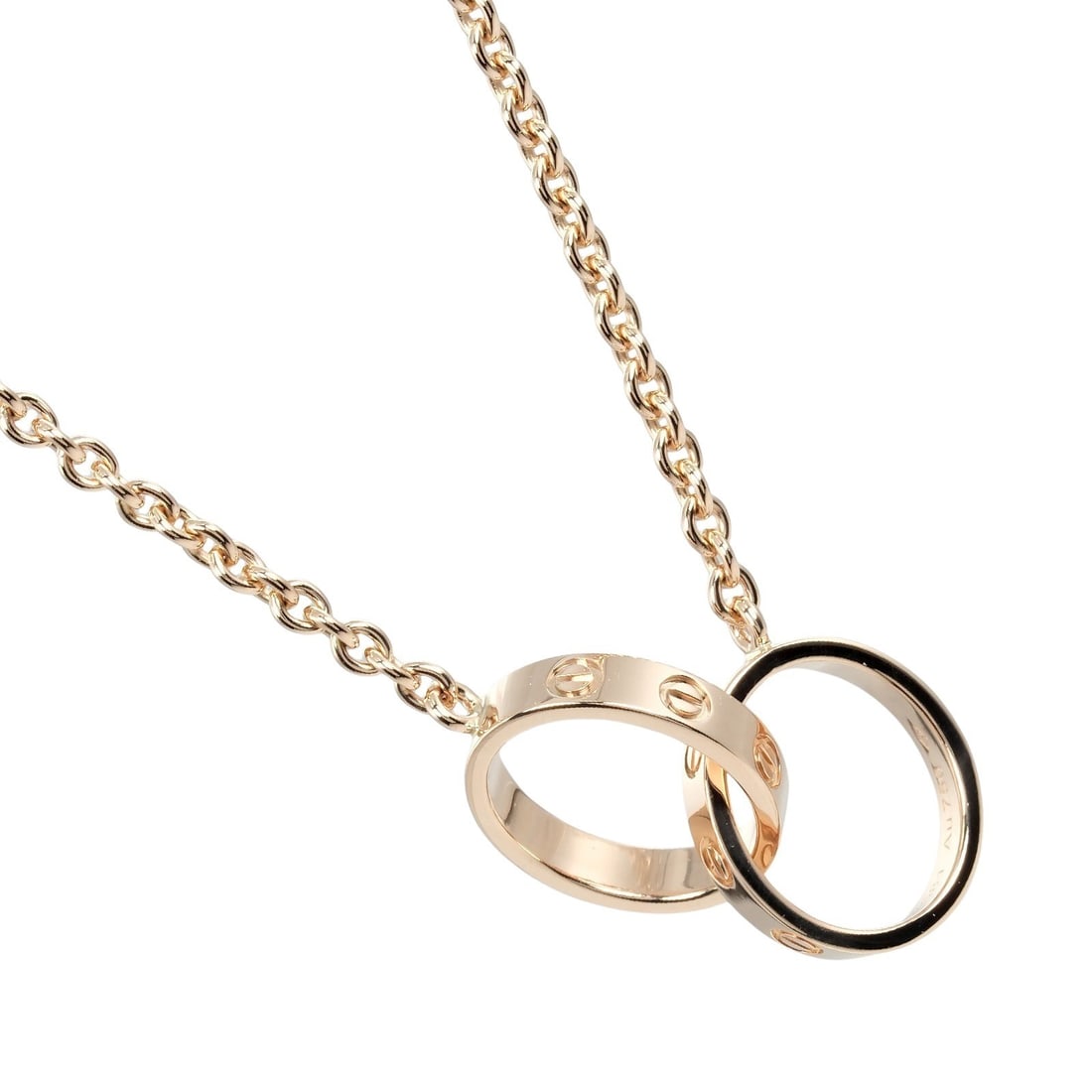 Cartier Love Baby Necklace in Gold Tone: Cartier Love Baby Necklace in Gold Tone This un-used Cartier Baby Love necklace is designed for women and features a pristine finish. As an authentic Cartier piece, it offers timeless elegance and exc