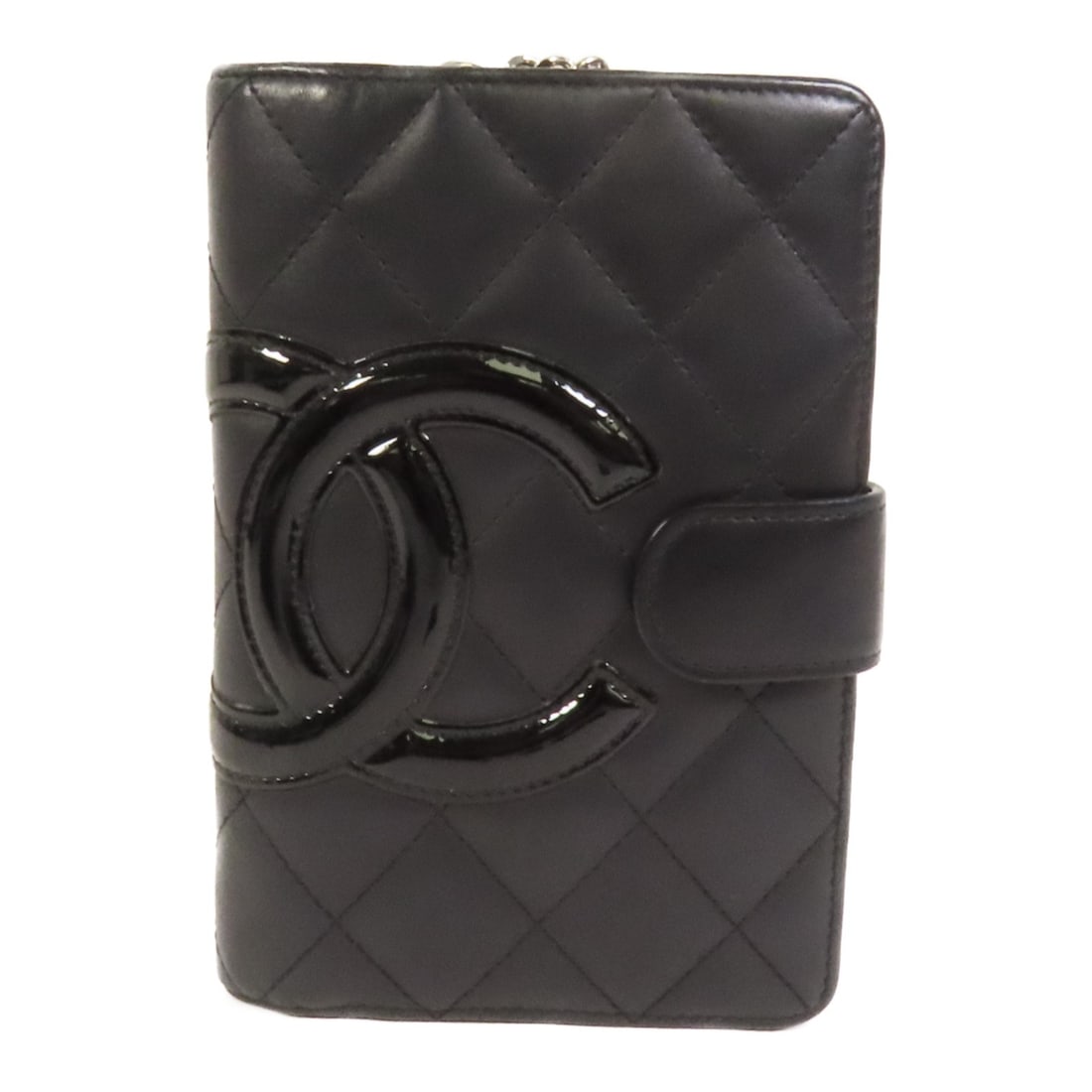 Black Cambon Calfskin Leather Bi-Fold Wallet by Chanel with Silver Hardware: Black Cambon Calfskin Leather Bi-Fold Wallet by Chanel with Silver Hardware This CHANEL Cambon bi-fold wallet is crafted from black calfskin leather and features silver-tone hardware. Made in France,