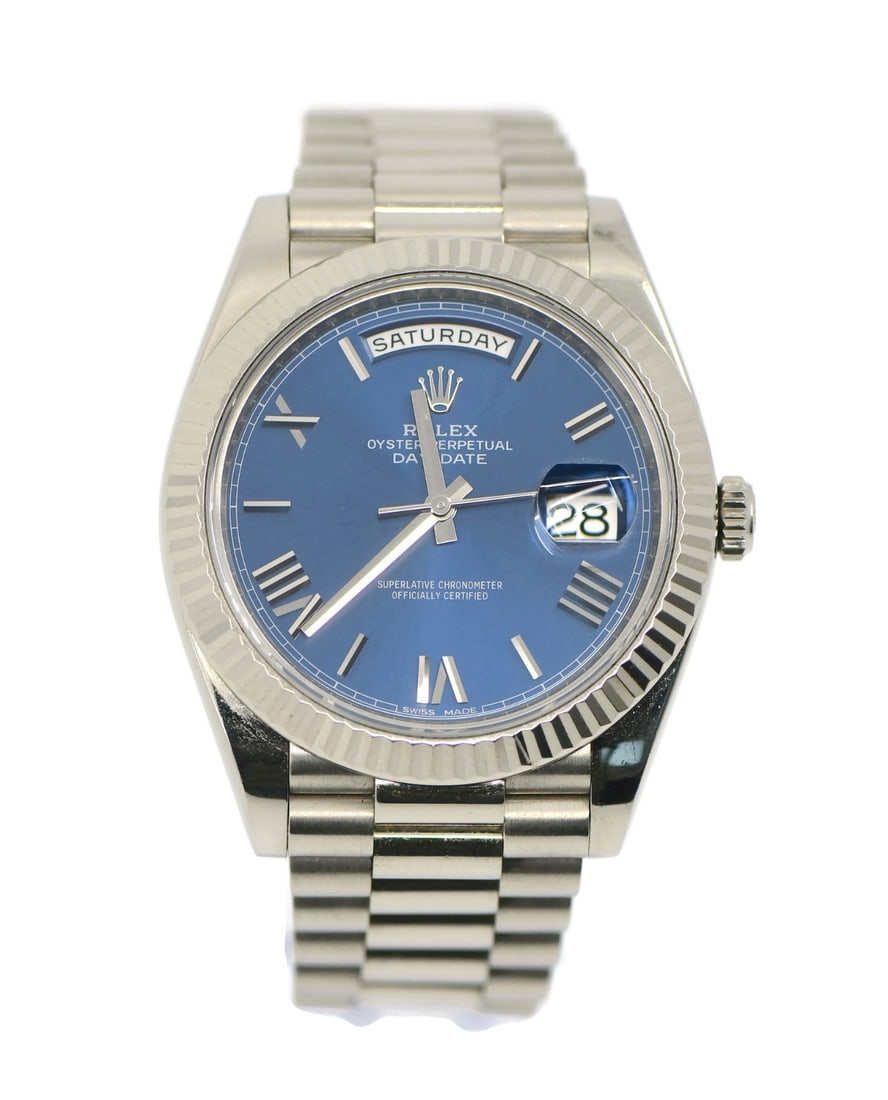 Rolex Day-Date 40mm 18K White Gold Automatic Watch Ref 228239: Rolex Day-Date 40mm 18K White Gold Automatic Watch Ref 228239 This stunning Rolex Day-Date 40 wristwatch is crafted from luxurious 18K white gold, showcasing a striking blue dial. The watch features a