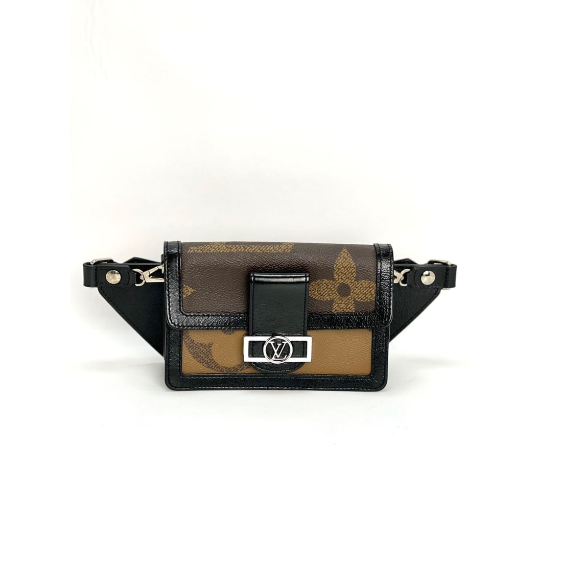 LOUIS VUITTON Dauphine Reverse Giant Monogram Clutch Bumbag: LOUIS VUITTON Dauphine Reverse Giant Monogram Clutch Bumbag Introducing the LOUIS VUITTON Reverse Giant Monogram Dauphine Bumbag Clutch, a stylish accessory perfect for casual outings or cocktail even