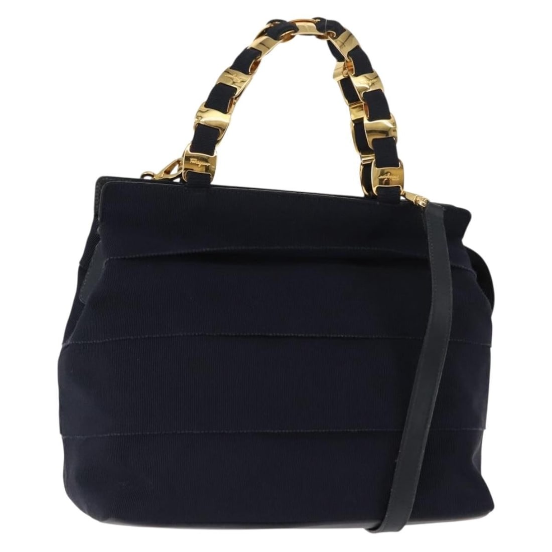 Navy Vala Shoulder Bag by Salvatore Ferragamo: Navy Vala Shoulder Bag by Salvatore Ferragamo This pre-owned Salvatore Ferragamo Vala handbag comes in navy and is designed for women. It is in good condition with visible signs of use, including surf