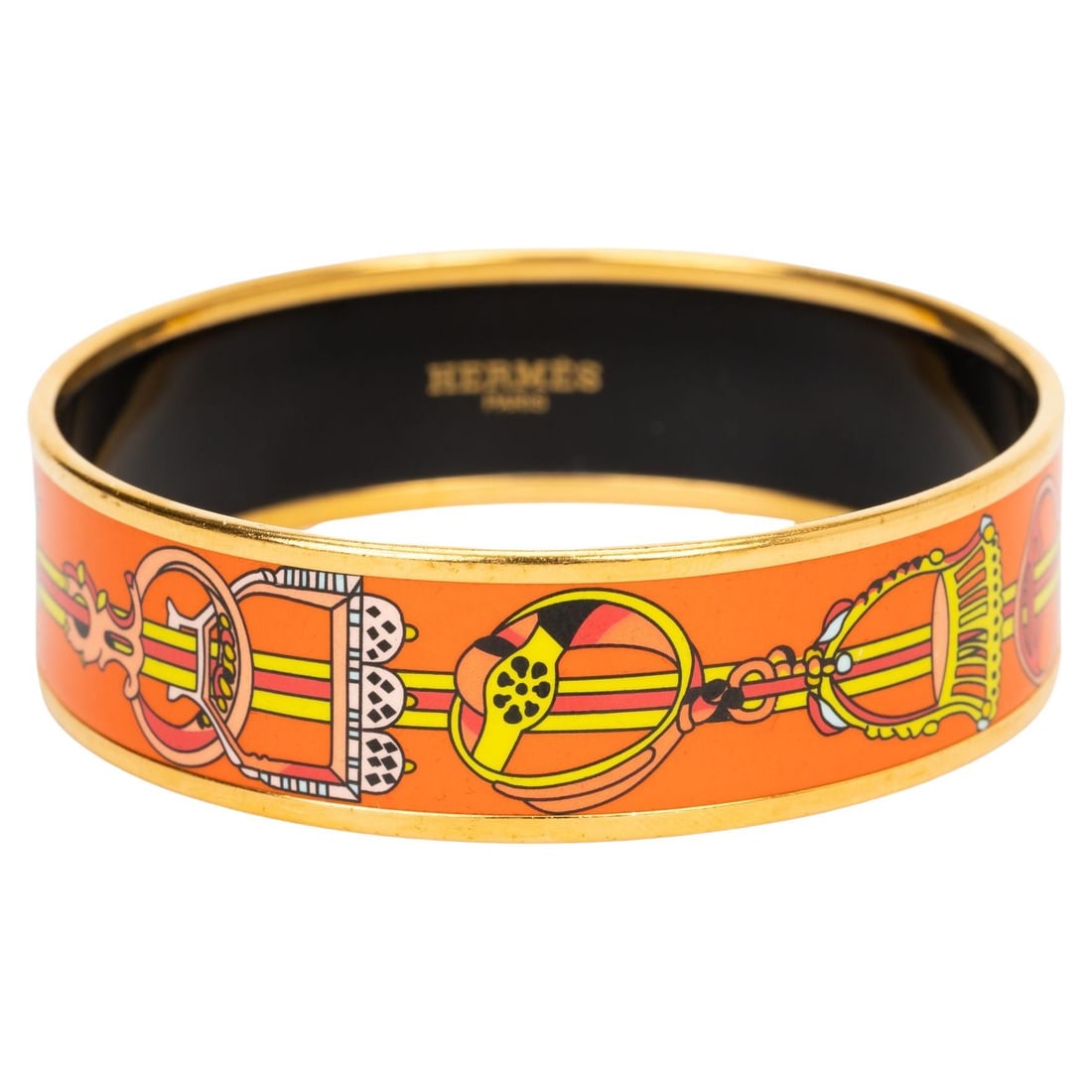Hermes Medium Orange Enamel Bangle Stirrup Design 2015: Hermes Medium Orange Enamel Bangle Stirrup Design 2015 This stunning Hermes Medium Orange Enamel Bangle showcases a vibrant stirrups print design in a rich orange hue complemented by gold accents. Cra