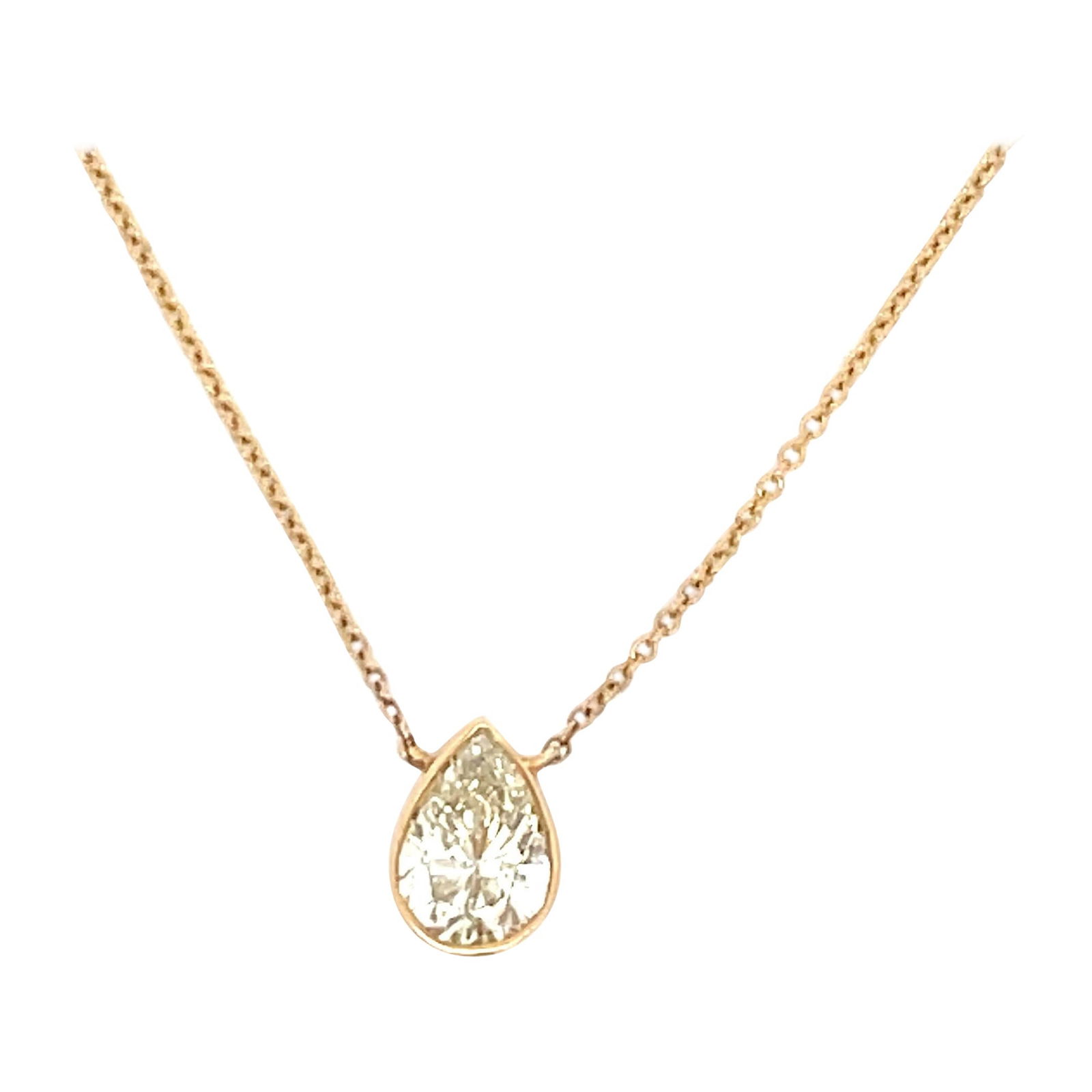 Harbor Diamonds 14K Yellow Gold Pear Shape Diamond Pendant 1.45ct: Harbor Diamonds 14K Yellow Gold Pear Shape Diamond Pendant 1.45ct This stunning diamond pendant features a pear-shaped yellow diamond weighing 1.45 carats, elegantly set in a 14 karat yellow gold beze