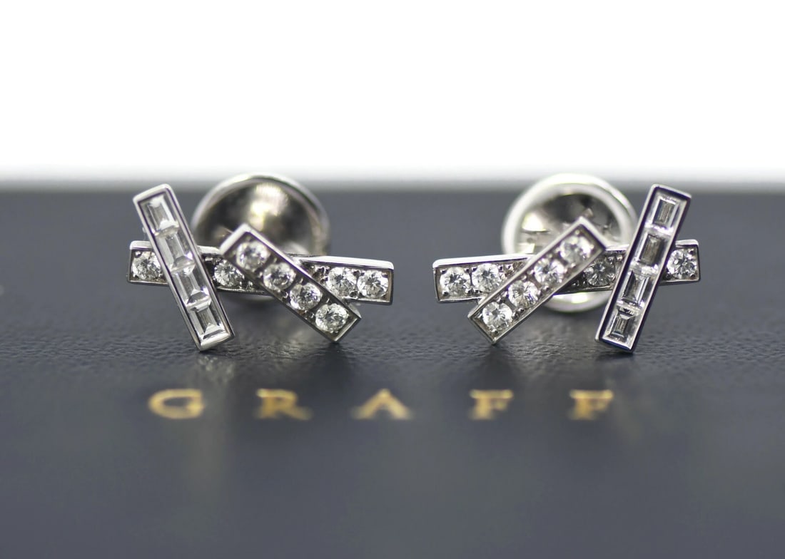 Graff 18K White Gold Threaded Diamond Stud Earrings: Graff 18K White Gold Threaded Diamond Stud Earrings Elevate your elegance with these exquisite Graff Threaded Diamond Earrings, crafted from luxurious 18K white gold. These stud earrings feature a stu