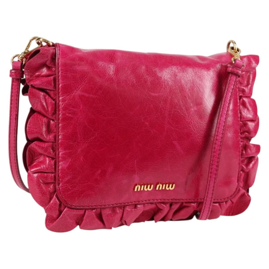 Pink Miu Miu Women's Shoulder Purse: Pink Miu Miu Women's Shoulder Purse This Miu Miu shoulder bag is designed for women and features a pink exterior. The bag shows signs of use, including some loss of shape, rubbing, slight stains, and