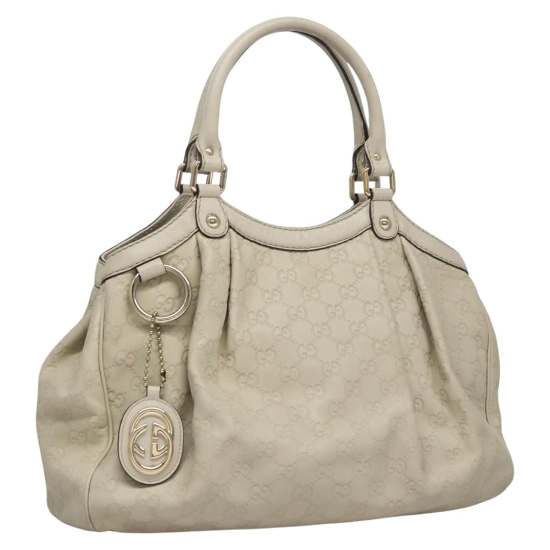 White Sukey Tote Bag by Gucci: White Sukey Tote Bag by Gucci This pre-owned Gucci Sukey Tote handbag in white is designed for women and crafted from leather. It remains in good condition, displaying signs of use such as rubbing, sl