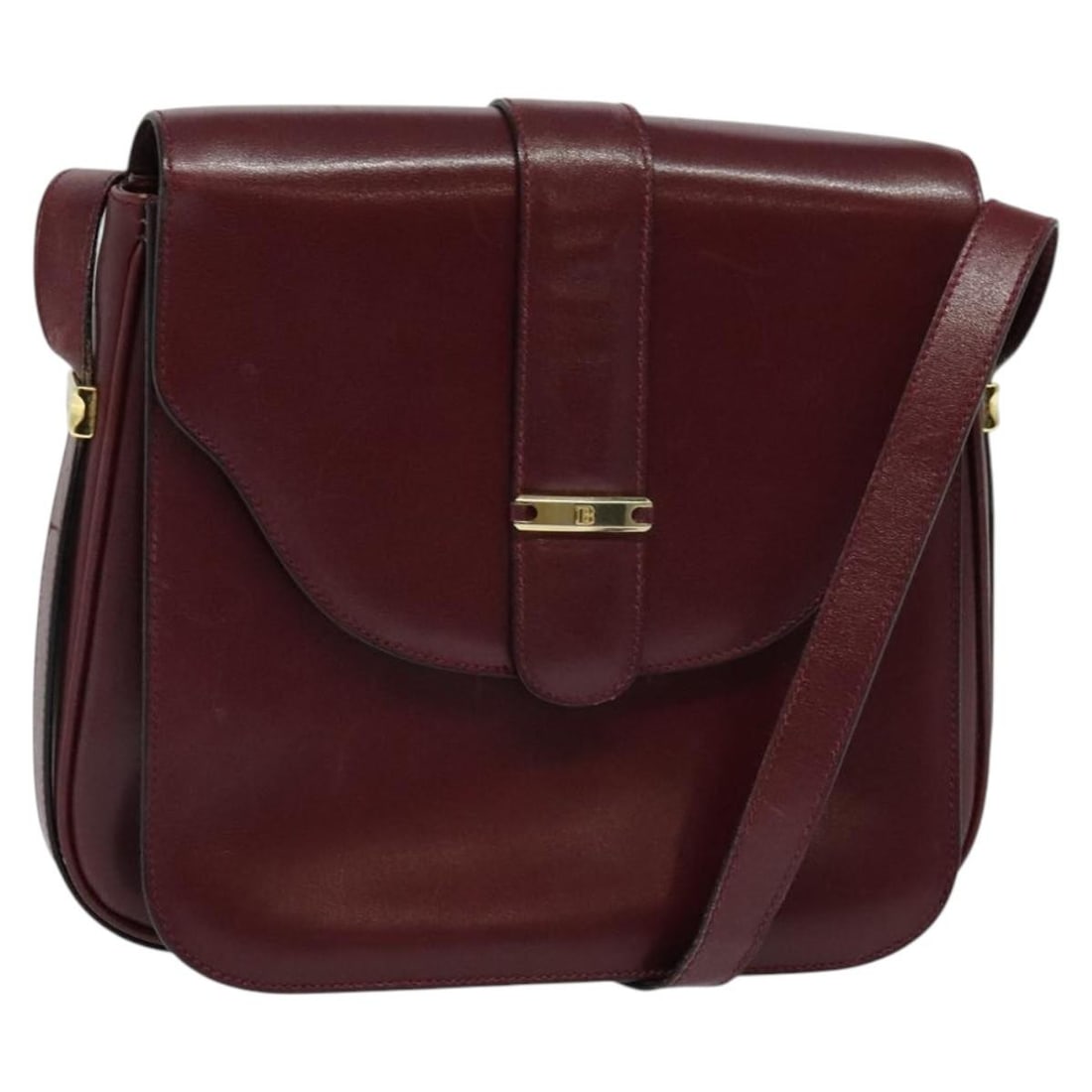 Burgundy Bally Shoulder Bag Vintage Style for Women: Burgundy Bally Shoulder Bag Vintage Style for Women This vintage Bally shoulder bag features a burgundy exterior with visible signs of rubbing, slight shape loss, and scratches on the surface and shou