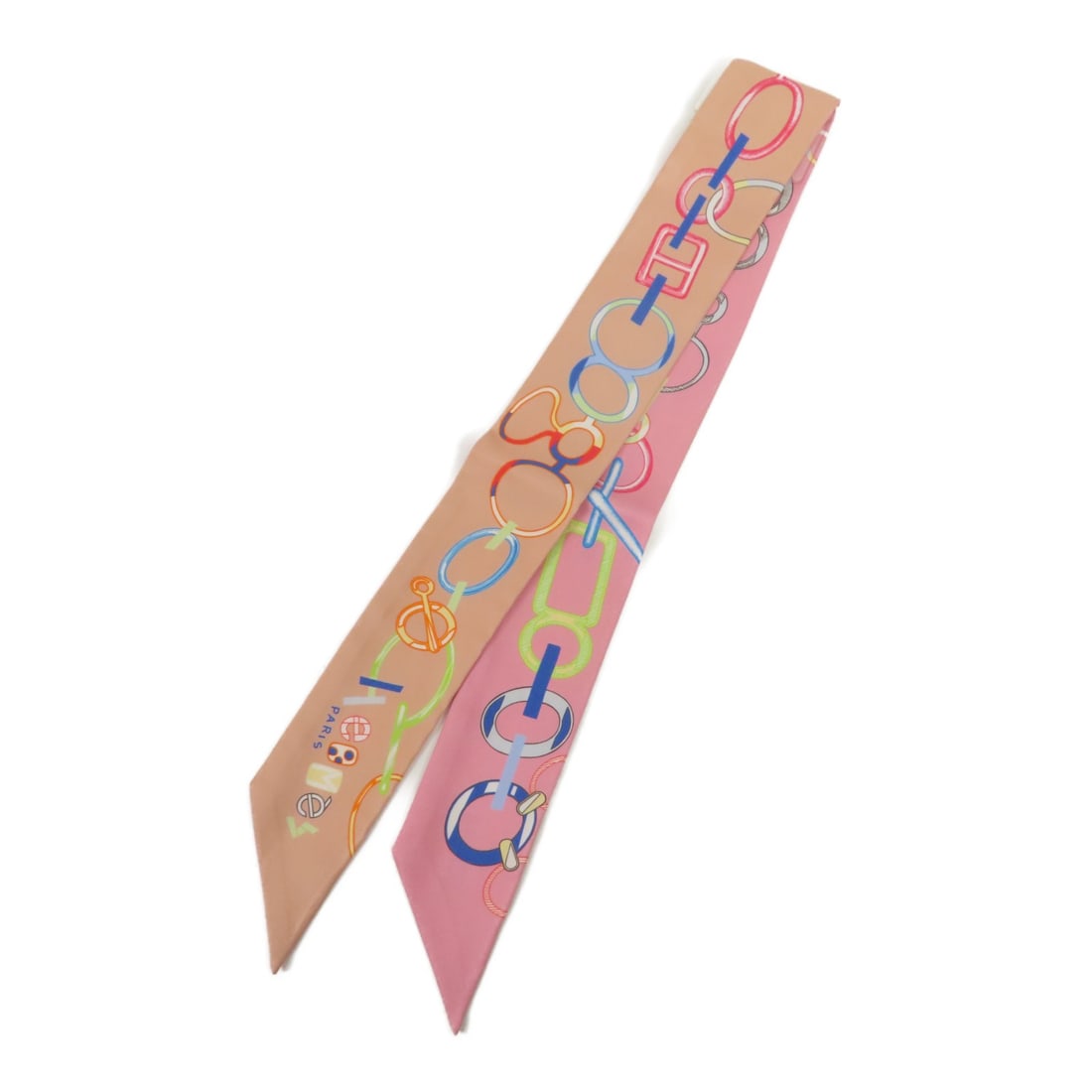 HERMES Multicolor Silk Twilly Scarf Made in France: HERMES Multicolor Silk Twilly Scarf Made in France Elevate your accessory collection with this exquisite HERMES Twilly Scarf. Made from luxurious silk, this multicolor scarf features a vibrant design