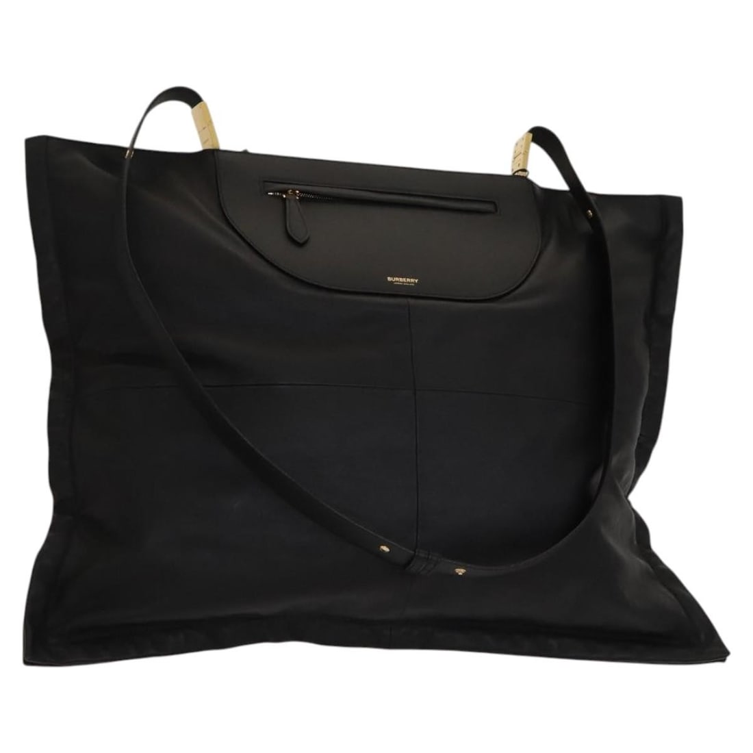 Vintage Burberry Black Shoulder Bag for Women: Vintage Burberry Black Shoulder Bag for Women This Burberry vintage shoulder bag features a classic black exterior with a well-loved appearance, showing signs of use such as rubbing, scratches, slight