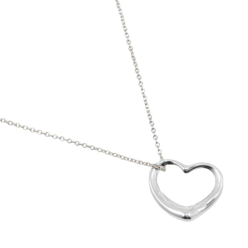 Elsa Peretti Open Heart Silver Necklace by Tiffany & Co.: Elsa Peretti Open Heart Silver Necklace by Tiffany & Co. This Tiffany & Co. Elsa Peretti Open Heart pendant necklace is crafted in polished silver and designed for women. The necklace displays fine su