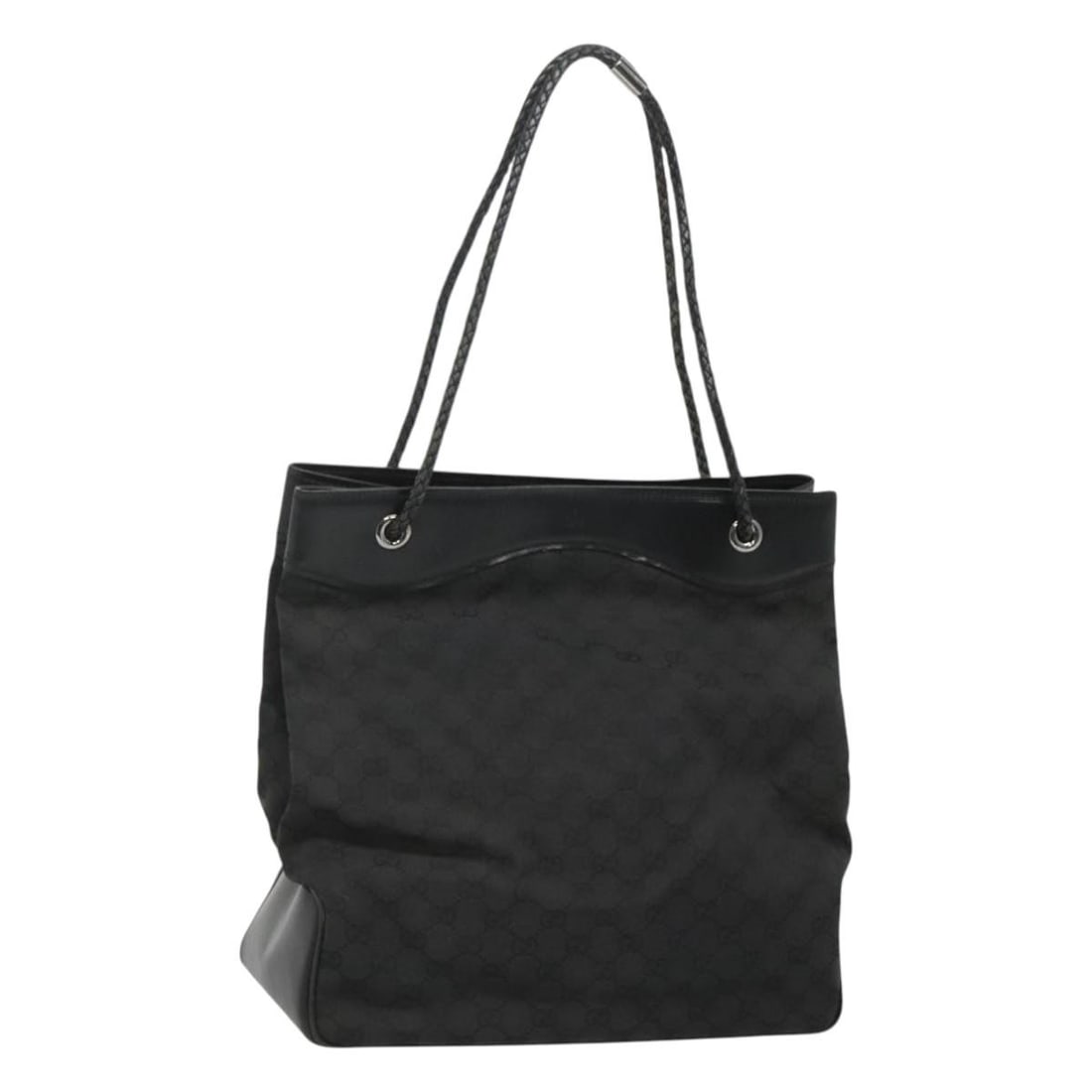 Black GG Canvas Tote by Gucci for Women: Black GG Canvas Tote by Gucci for Women This Gucci GG Canvas tote bag in black is designed for female use and offers a spacious and functional style. The exterior canvas surface shows some loss of sha