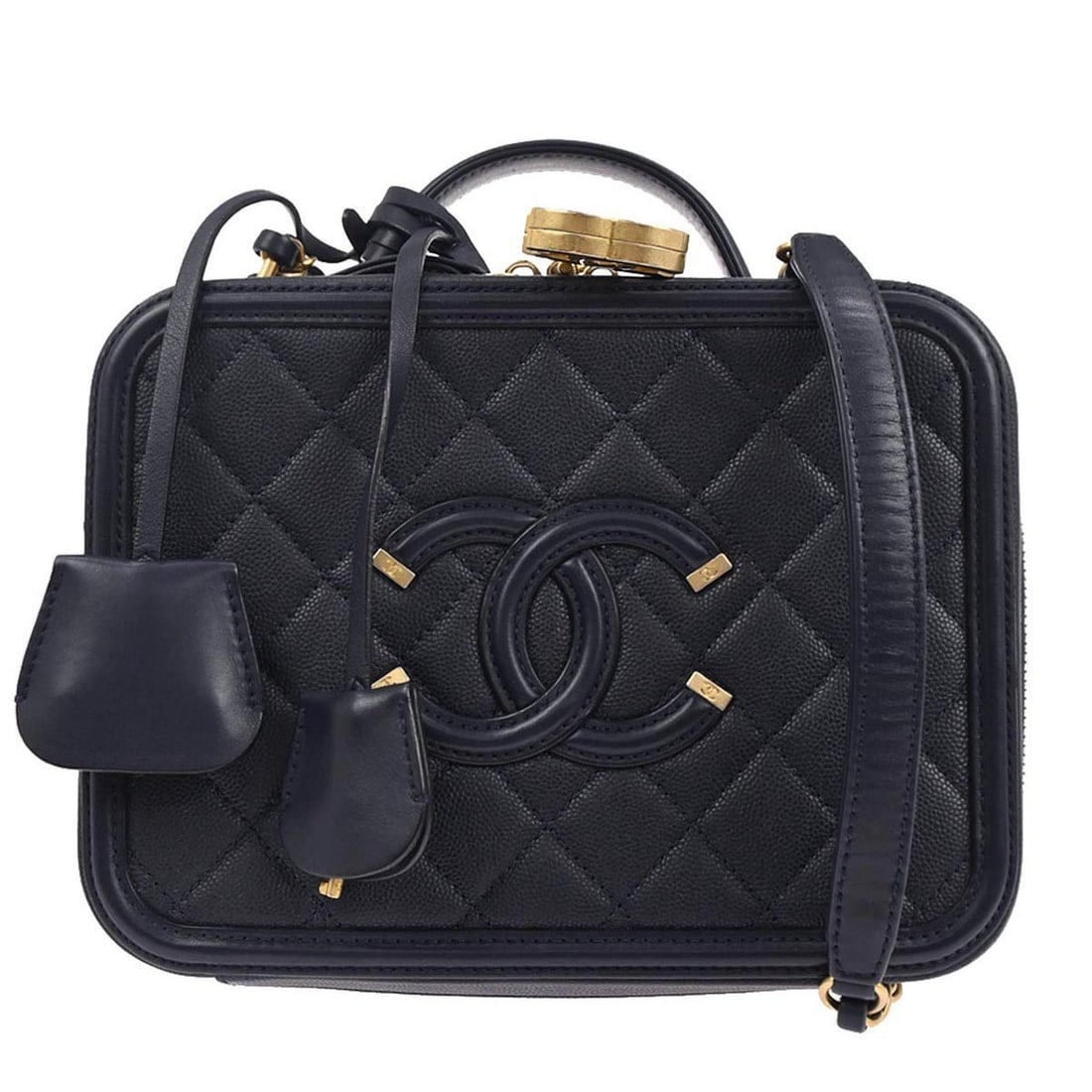 Navy Calfskin Chanel CC Filigree Small Vanity Bag with Top Handle: Navy Calfskin Chanel CC Filigree Small Vanity Bag with Top Handle This Chanel CC Filigree 2-way vanity handbag is crafted from navy leather and features a top handle design with logo accents. Its