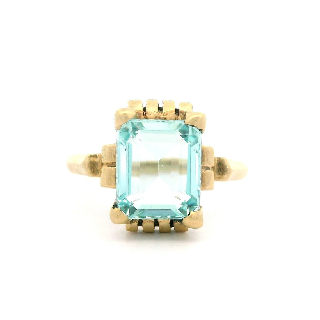 Vintage 10k Yellow Gold Aquamarine Cocktail Ring with Scroll Work: Vintage 10k Yellow Gold Aquamarine Cocktail Ring with Scroll Work This exquisite vintage retro ring features a stunning natural genuine aquamarine stone, celebrated for its captivating slightly greeni