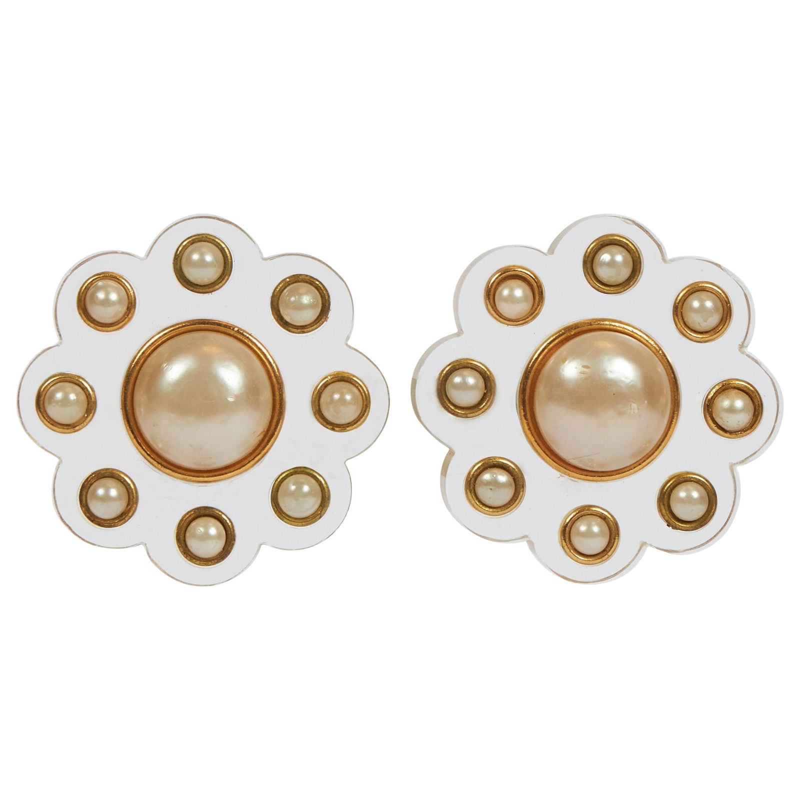 1980s Chanel Rare Lucite Faux Pearl Flower Earrings France: 1980s Chanel Rare Lucite Faux Pearl Flower Earrings France Discover these exquisite 1980's Vintage Chanel Rare Lucite Pearl Flower Earrings, a stunning collectible piece from the mid-80s. Crafted in F