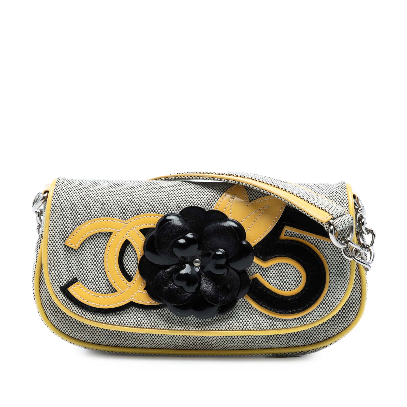 Chanel Canvas CC Camellia No 5 Gray Shoulder Bag: Chanel Canvas CC Camellia No 5 Gray Shoulder Bag Introducing the Chanel Canvas CC Camellia No. 5 Shoulder Bag, a stylish accessory that combines a chic design with practical features. This bag showcas