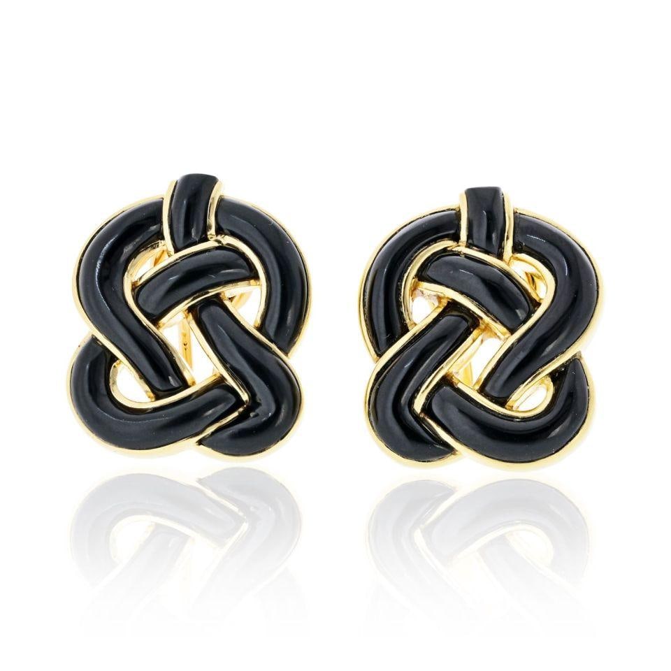 Angela Cummings 18K Yellow Gold Black Onyx Knot Clip Earrings: Angela Cummings 18K Yellow Gold Black Onyx Knot Clip Earrings These stunning Angela Cummings earrings feature an elegant knot design crafted from luxurious 18K yellow gold, complemented by striking bl
