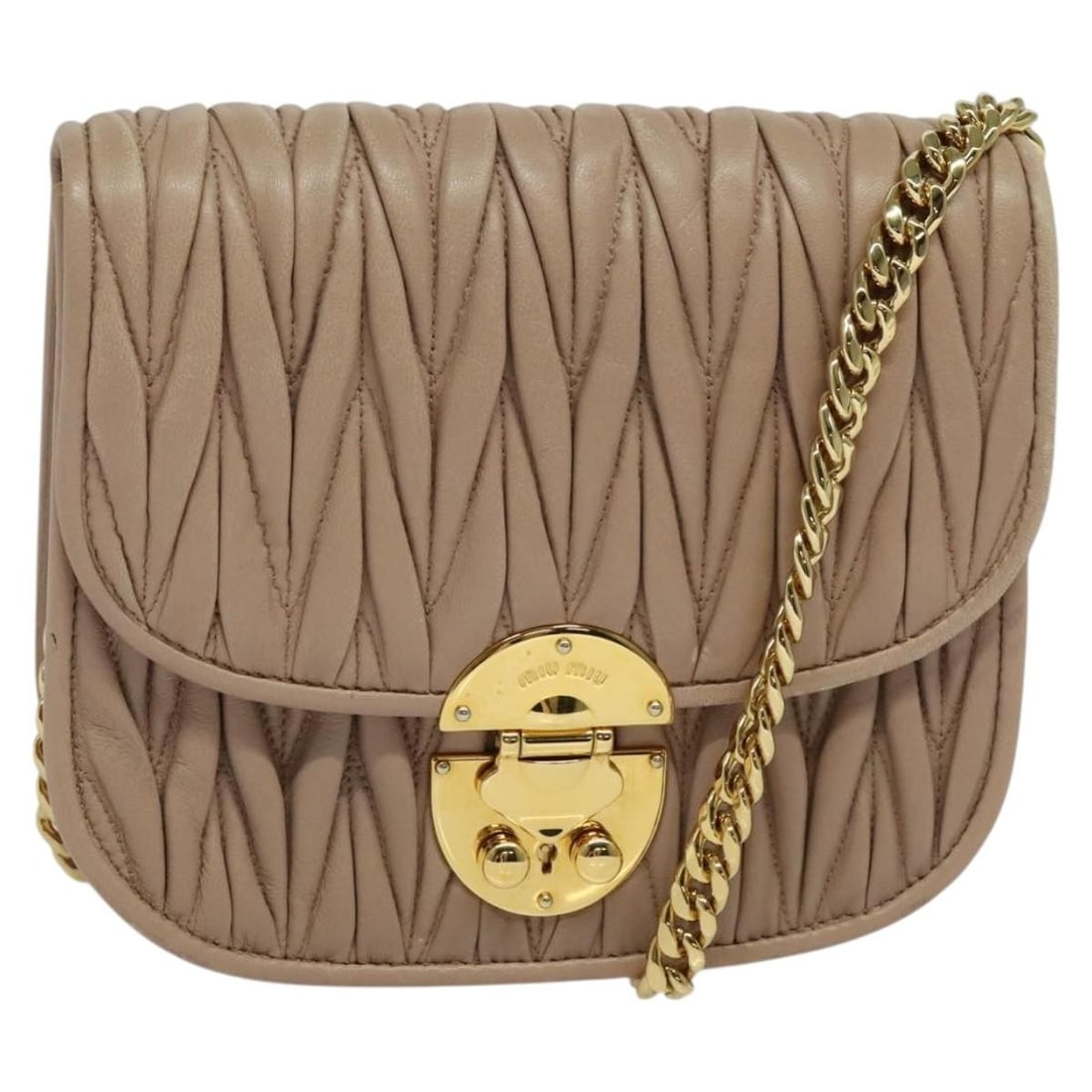 Beige Chain Flap Shoulder Bag by Miu Miu: Beige Chain Flap Shoulder Bag by Miu Miu This Miu Miu chain flap crossbody bag in beige offers a stylish and functional accessory for daily use. It features a chain shoulder strap and a flap closure.