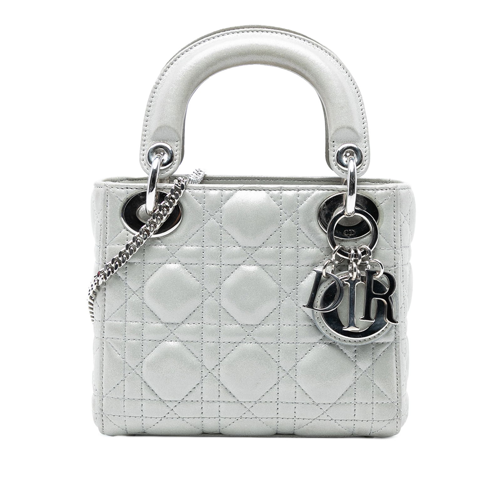 Dior Mini Iridescent Lambskin Cannage Lady Dior Bag: Dior Mini Iridescent Lambskin Cannage Lady Dior Bag Introducing the Mini Iridescent Lambskin Cannage Lady Dior, a stunning blend of elegance and practicality. This exquisite bag is crafted from quilte