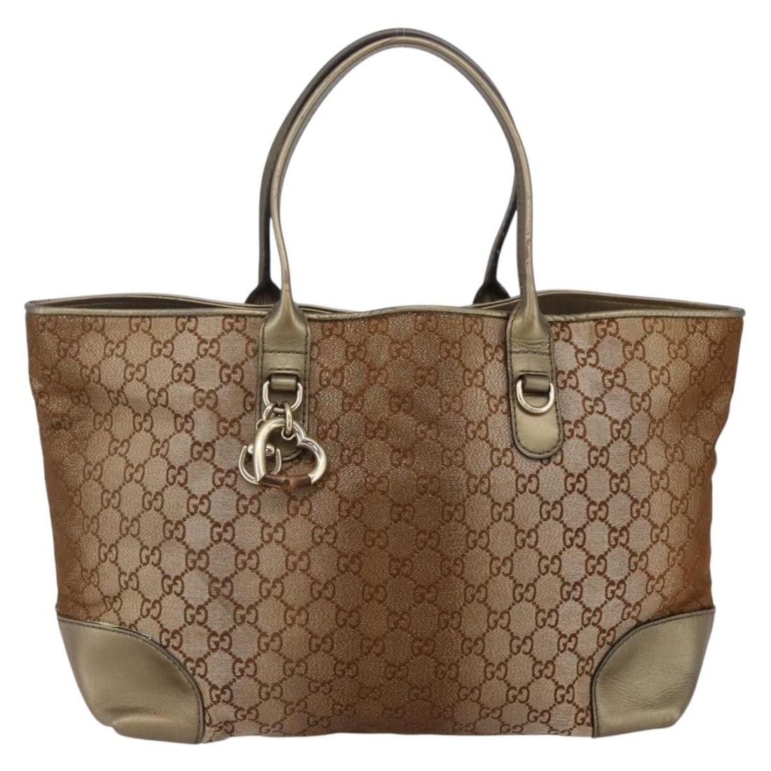 Heart Bit Beige Tote Bag by Gucci: Heart Bit Beige Tote Bag by Gucci This pre-owned Gucci Heart Bit Open Tote in beige is crafted for women and features a spacious interior. The bag shows visible signs of use, including surface rubbing