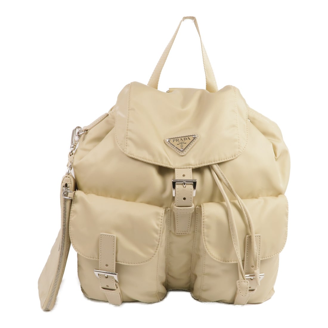 PRADA Beige Nylon Rucksack Backpack Made in Italy: PRADA Beige Nylon Rucksack Backpack Made in Italy This PRADA rucksack backpack is crafted from high-quality nylon in a stylish beige color. Designed for both functionality and fashion, it features a s
