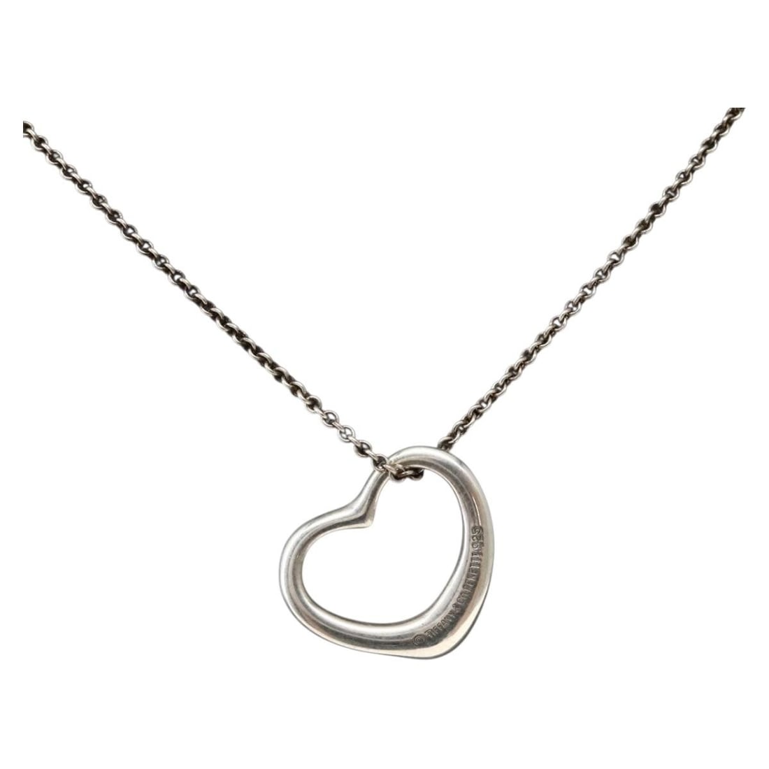 Tiffany & Co. Open Heart Necklace Ag925 Silver Authentic: Tiffany & Co. Open Heart Necklace Ag925 Silver Authentic This stunning Tiffany & Co. Open Heart Necklace is crafted from high-quality Ag925 silver, showcasing the brand's iconic design. The necklace m