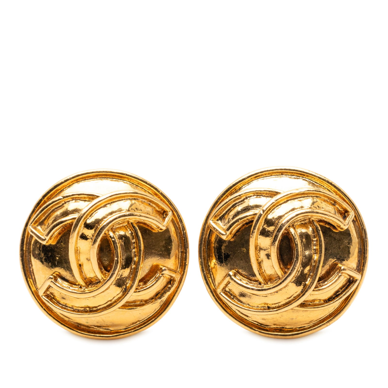 Chanel CC Logo Gold Tone Metal Round Clip Earrings: Chanel CC Logo Gold Tone Metal Round Clip Earrings These Chanel clip-on earrings feature a round gold-tone metal body with the iconic CC logo. Designed as costume jewelry, they offer a classic and sop