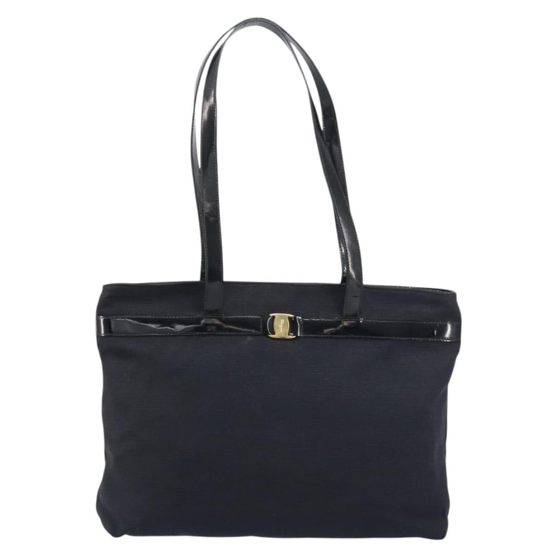 Black Vala Tote Bag by Salvatore Ferragamo: Black Vala Tote Bag by Salvatore Ferragamo This pre-owned Salvatore Ferragamo tote bag is designed for women and features a black exterior. The bag exhibits visible signs of use, including surface rub