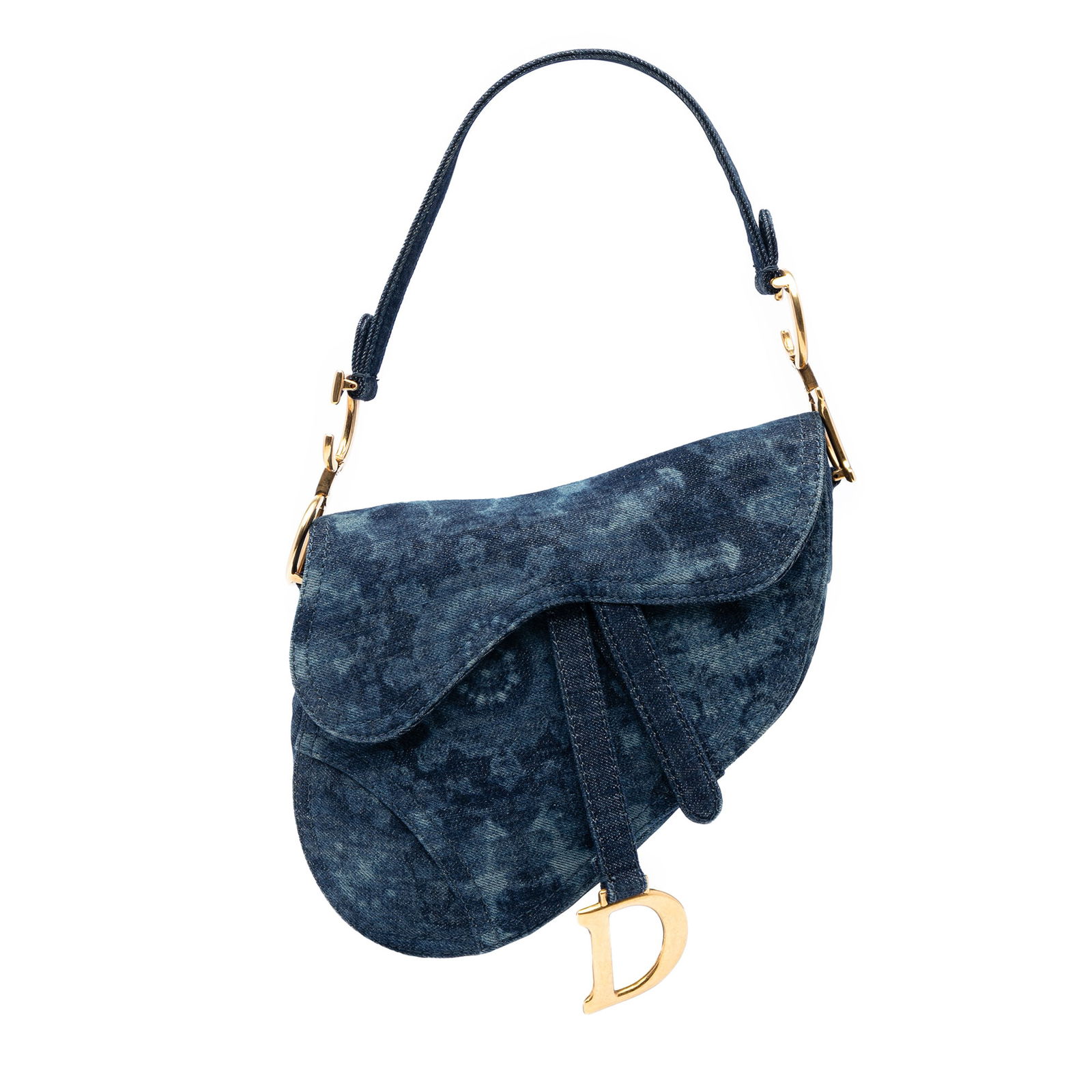 Dior Denim Tie Dye Saddle Bag Blue Fabric Italy: Dior Denim Tie Dye Saddle Bag Blue Fabric Italy The Dior Denim Tie Dye Saddle Bag is a stylish and practical accessory crafted from printed denim. It features a flat denim handle, a secure flap closur