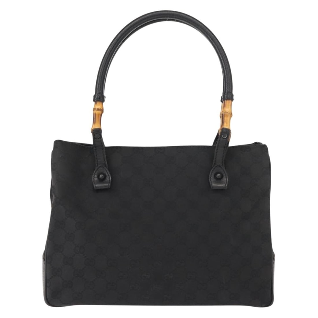 Vintage Gucci Black Tote with Bamboo Top Handle: Vintage Gucci Black Tote with Bamboo Top Handle This pre-owned Gucci Vintage Bamboo Handle Tote Bag in black is designed for female use. It features the iconic bamboo handles and is crafted from leath