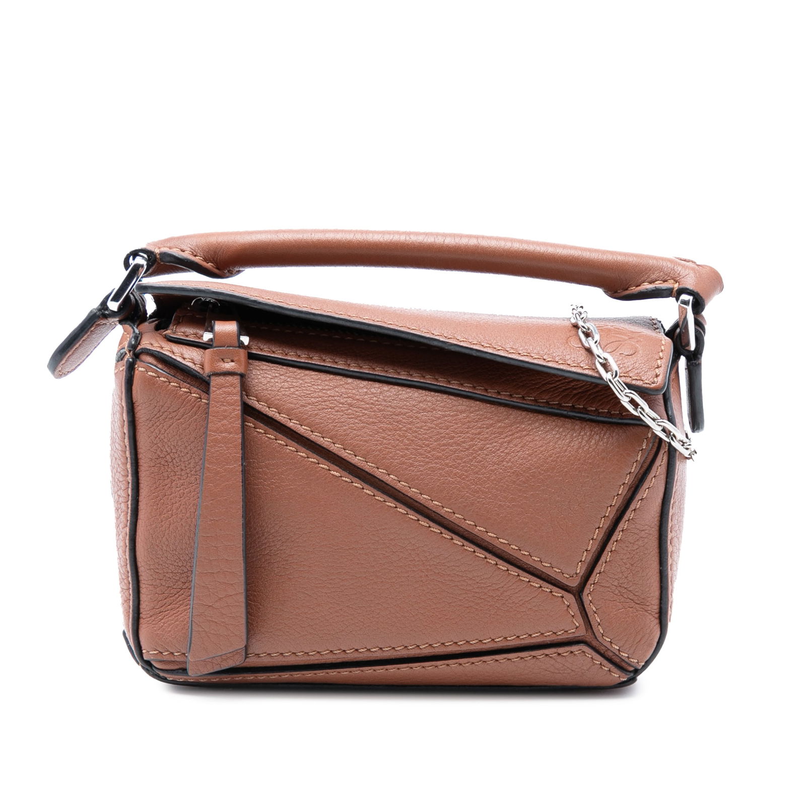 LOEWE Nano Puzzle Satchel Brown Calfskin Leather Bag: LOEWE Nano Puzzle Satchel Brown Calfskin Leather Bag Introducing the LOEWE Nano Calfskin Puzzle Satchel, a stylish and compact bag crafted from high-quality leather. This exquisite piece features a ro