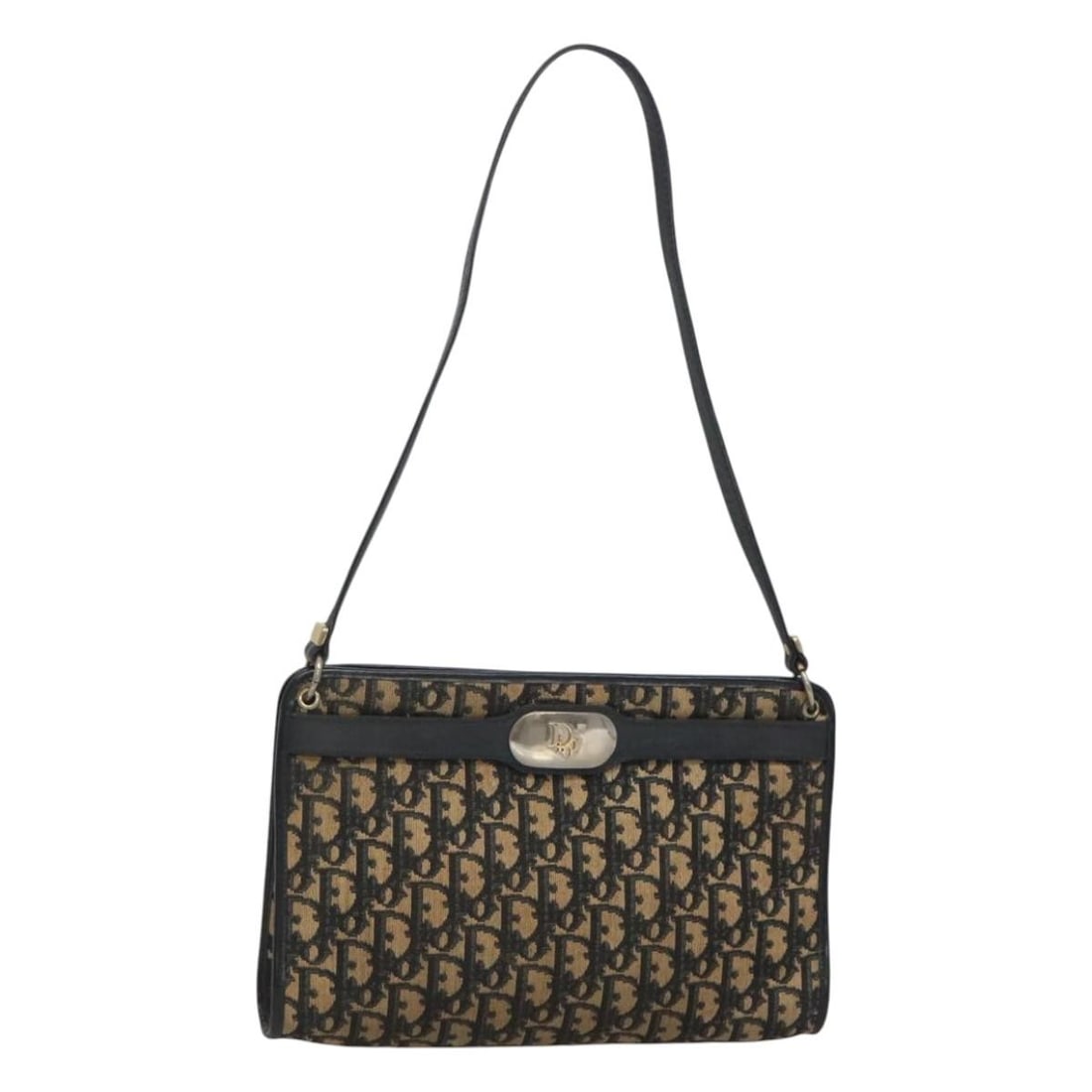 Navy Trotter Shoulder Bag by Christian Dior Vintage Collection: Navy Trotter Shoulder Bag by Christian Dior Vintage Collection This vintage Christian Dior Trotter shoulder bag in navy is designed for women and features a spacious interior. The pre-owned bag shows