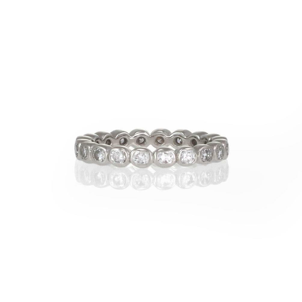 Cartier Platinum Diamond Bezel Band Ring 40pts Size 4 with Certificate: Cartier Platinum Diamond Bezel Band Ring 40pts Size 4 with Certificate This exquisite band ring by Cartier showcases a stunning design crafted from high-quality platinum with a polished finish. The ri