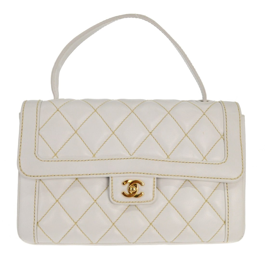 Large White Calfskin Top Handle Bag from Chanel Wild Stitch Collection: Large White Calfskin Top Handle Bag from Chanel Wild Stitch Collection This Chanel handbag features white calfskin leather with wild stitch detailing and a top handle design. It is equipped with a tur