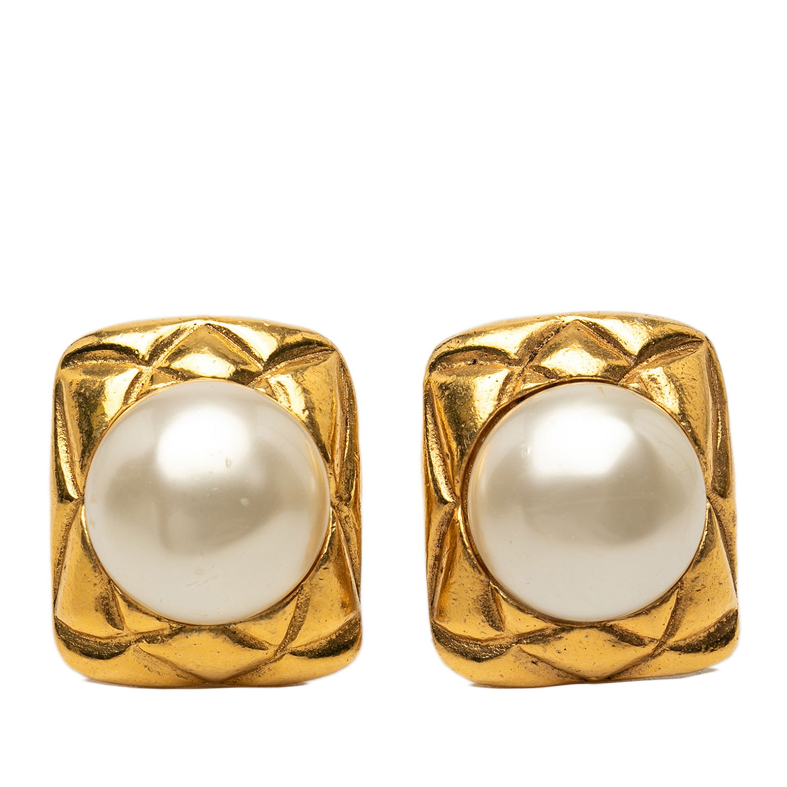 Chanel Faux Pearl Gold Plated Clip Earrings: Chanel Faux Pearl Gold Plated Clip Earrings These Chanel clip-on earrings feature gold plated metal bodies adorned with faux pearl embellishments. Designed in France, they are a stylish example of cos