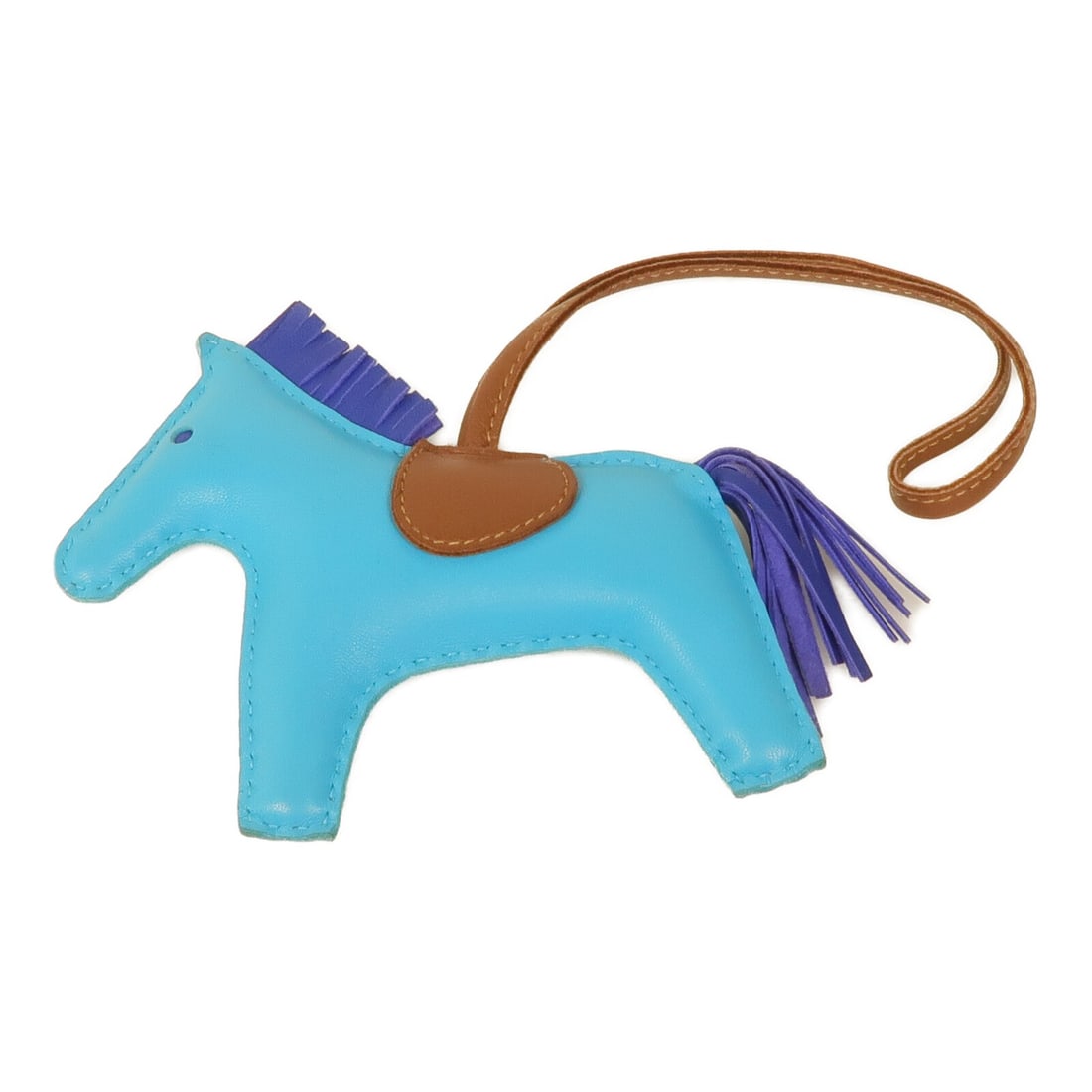 Hermes Rodeo MM Charm Blue Brown Lambskin Leather: Hermes Rodeo MM Charm Blue Brown Lambskin Leather Enhance your accessory collection with this exquisite Hermes Rodeo MM Charm, crafted from luxurious lambskin leather. This charming piece features a s
