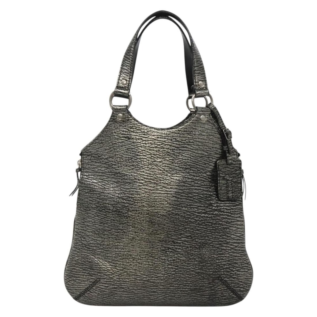 Saint Laurent Tribute Silver Shoulder Tote Bag: Saint Laurent Tribute Silver Shoulder Tote Bag This Saint Laurent Tribute Tote in silver is a stylish shoulder bag designed for women. The exterior shows slight rubbing, while the shoulder strap exhib