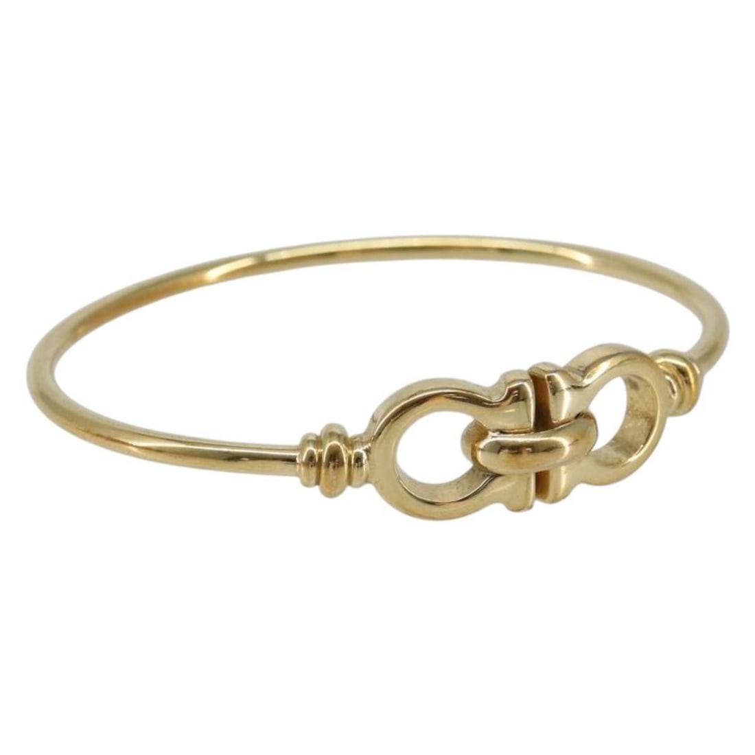 Salvatore Ferragamo Gold Gancini Bracelet Authentic Italy: Salvatore Ferragamo Gold Gancini Bracelet Authentic Italy Elevate your accessory collection with this exquisite Salvatore Ferragamo Gancini Bracelet, crafted in Italy. This elegant piece features a lu
