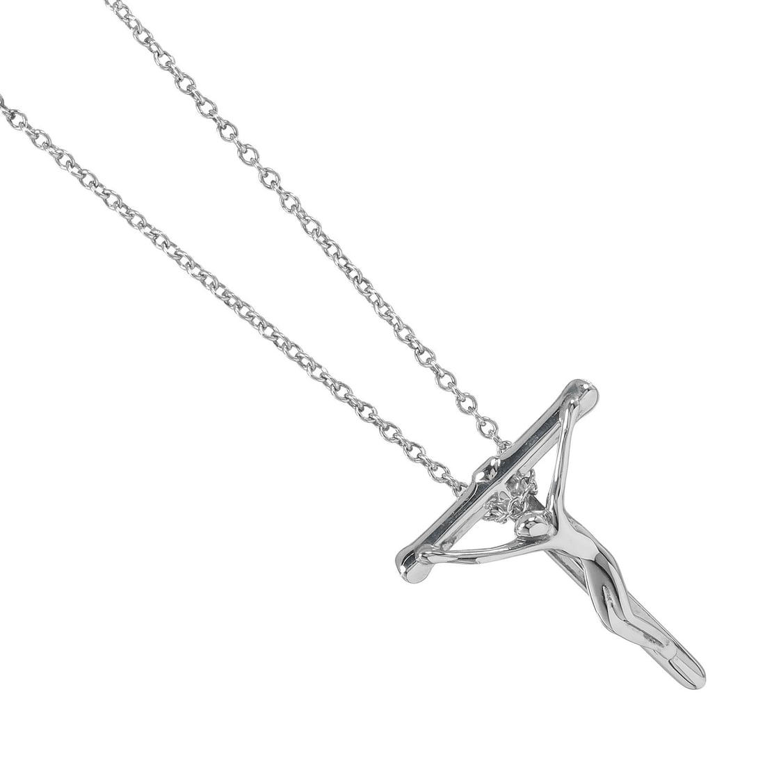 Crucifix Silver Pendant Necklace by Tiffany & Co.: Crucifix Silver Pendant Necklace by Tiffany & Co. This Tiffany & Co. crucifix pendant necklace is crafted in polished silver. Designed for women, it features a classic crucifix pendant and comes in ex