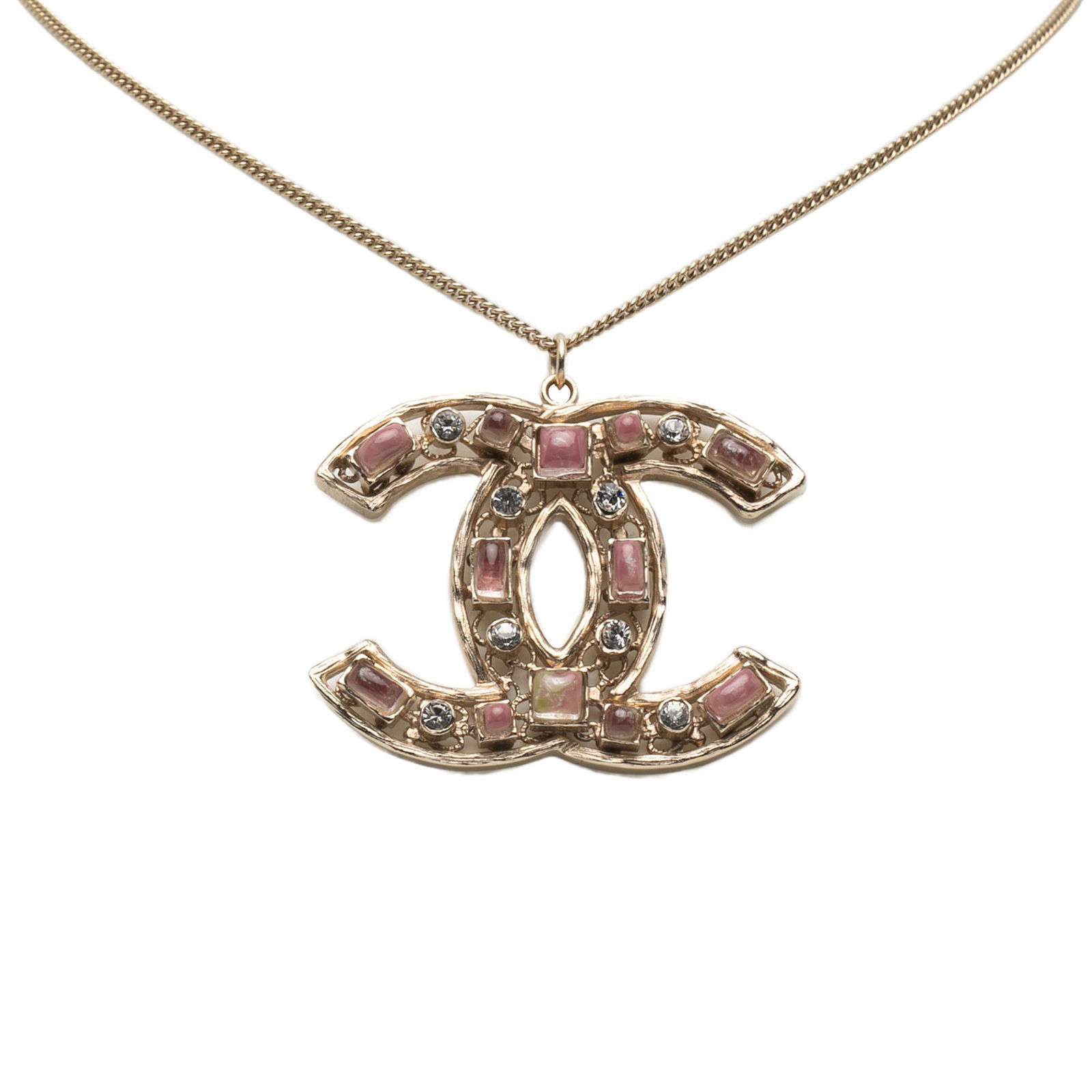 Chanel Gold Plated CC Pendant Necklace with Crystals: Chanel Gold Plated CC Pendant Necklace with Crystals Elevate your accessory collection with this stunning Chanel Gold Plated CC Crystals Pendant Necklace. Crafted from gold-tone metal, this exquisite