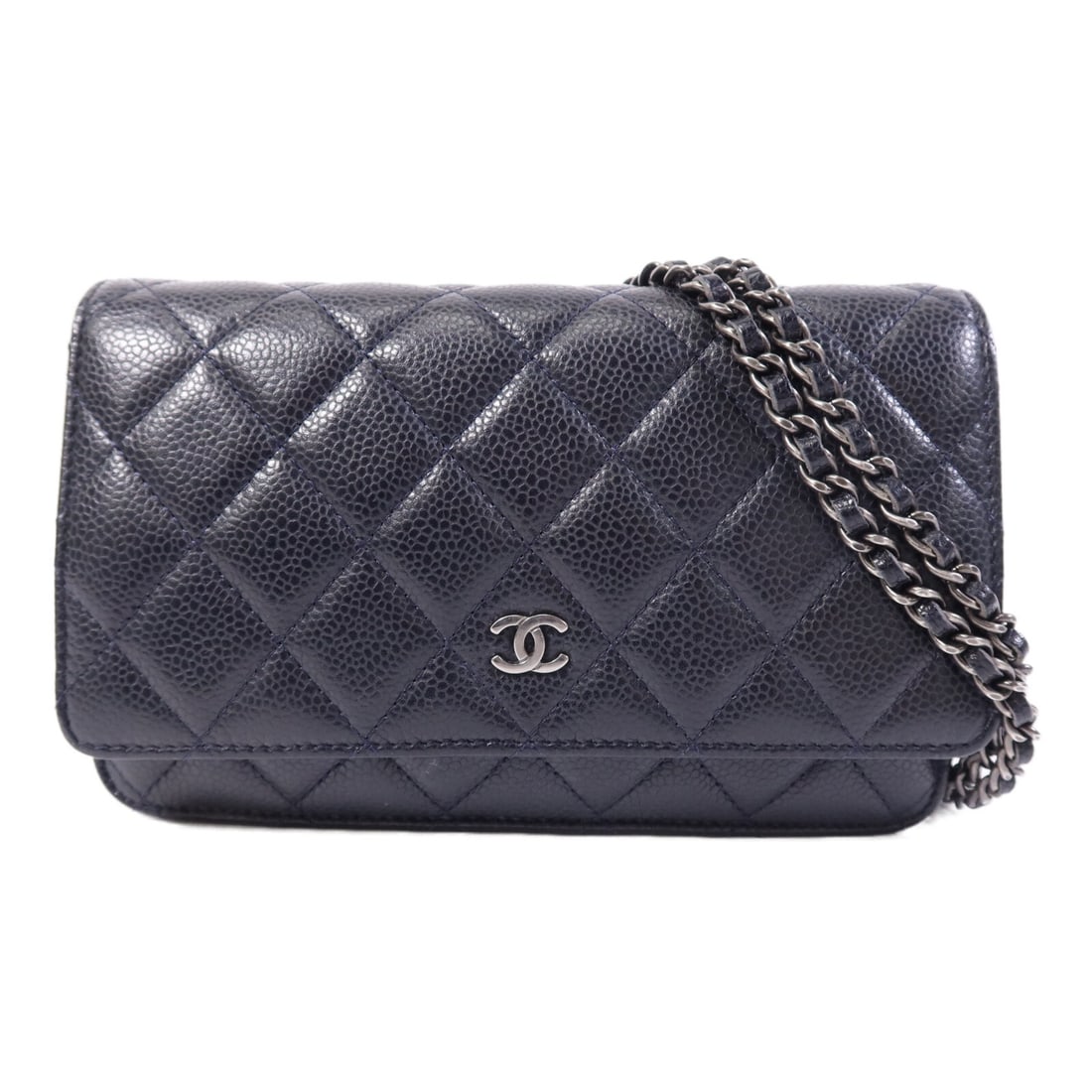 Chanel Navy Calfskin Leather Wallet on Chain Shoulder Purse: Chanel Navy Calfskin Leather Wallet on Chain Shoulder Purse This CHANEL Wallet On Chain (WOC) shoulder bag is crafted from navy calfskin leather. It features the iconic CC logo and silver-tone hardwar